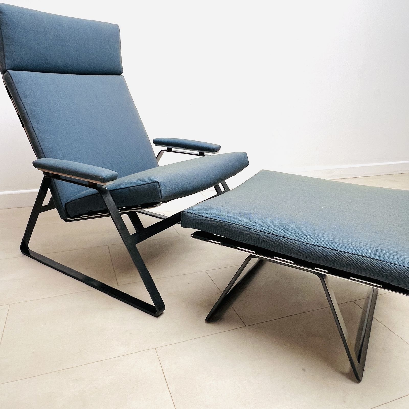British Lounge Chair And Footstool By William Plunkett photo vinterior