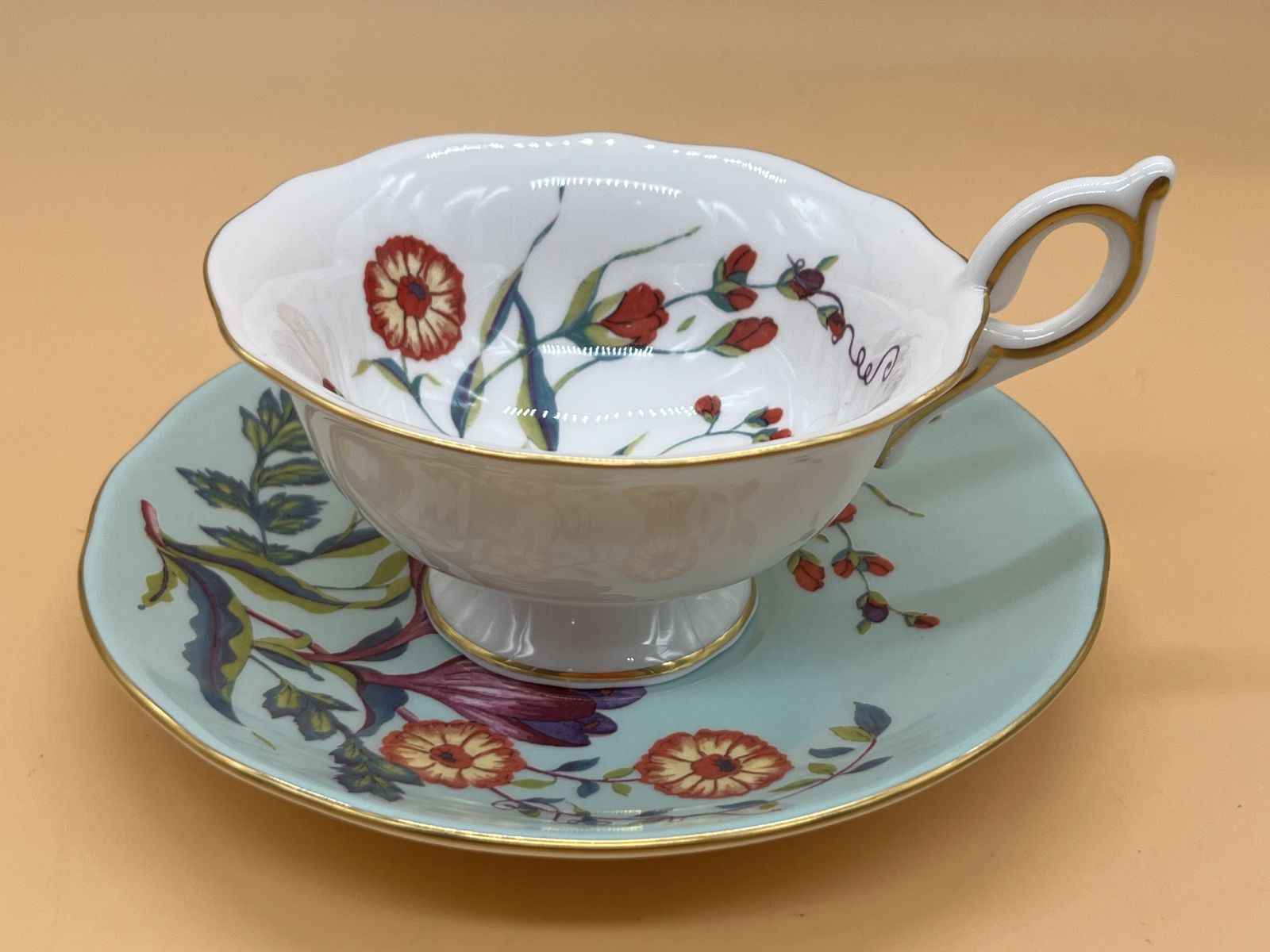 Wedgwood China Harlequin Collection Turquoise Crocus Design Footed Tea Cup And Saucer Duo.