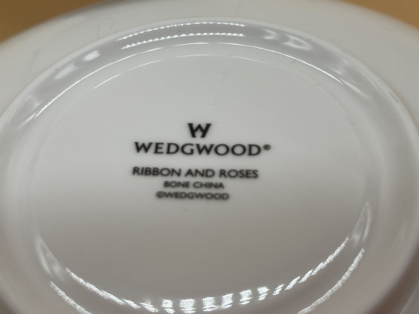 Wedgwood China Harlequin Collection Ribbon And Roses Design Footed Tea Cup And Saucer Duo. photo vintage