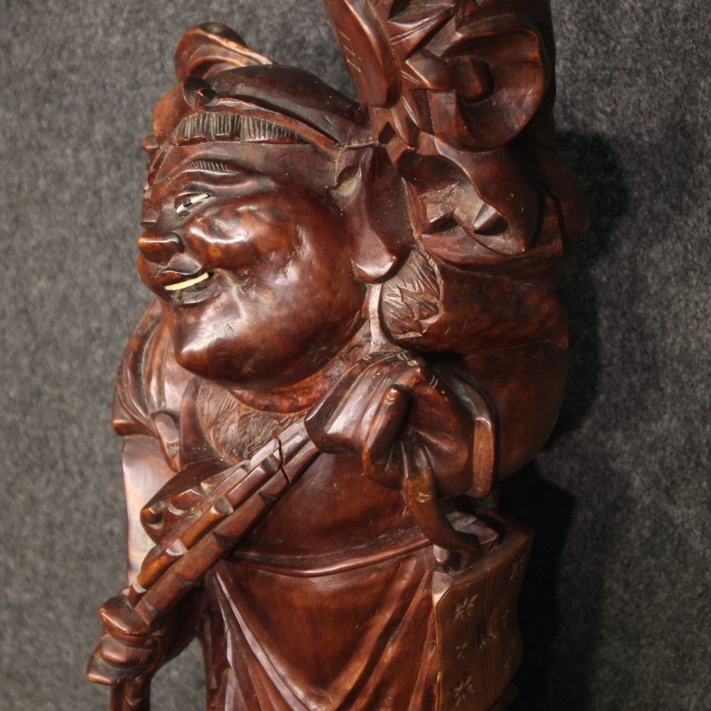 photo for sale Oriental Wooden Sculpture From The 60s
