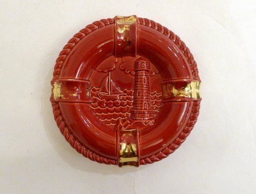 photo furniture Buoy Ashtray In Red Earthenware And Gilding With Marine Decoration From Verceram, France 1950s 1960s