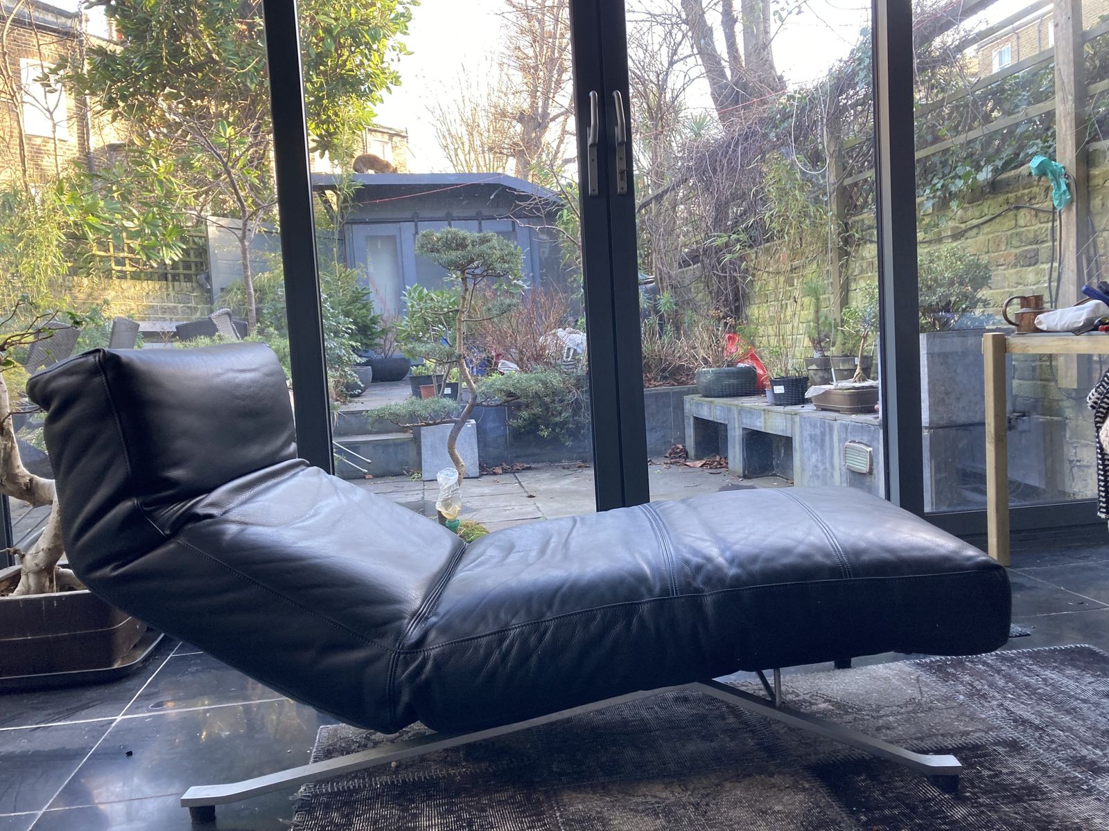 Eilerson Control Recliner. Dark Charcoal Leather. Heals. Exc. Condition. photo for sale