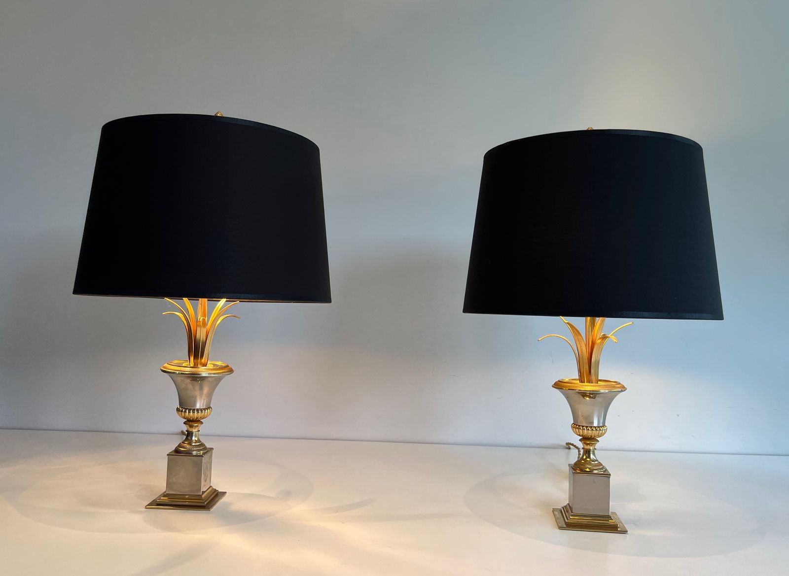 Pair Of Chrome And Brass Palm Tree Lamps In The Style Of Maison Charles. Circa 1970 photo for sale