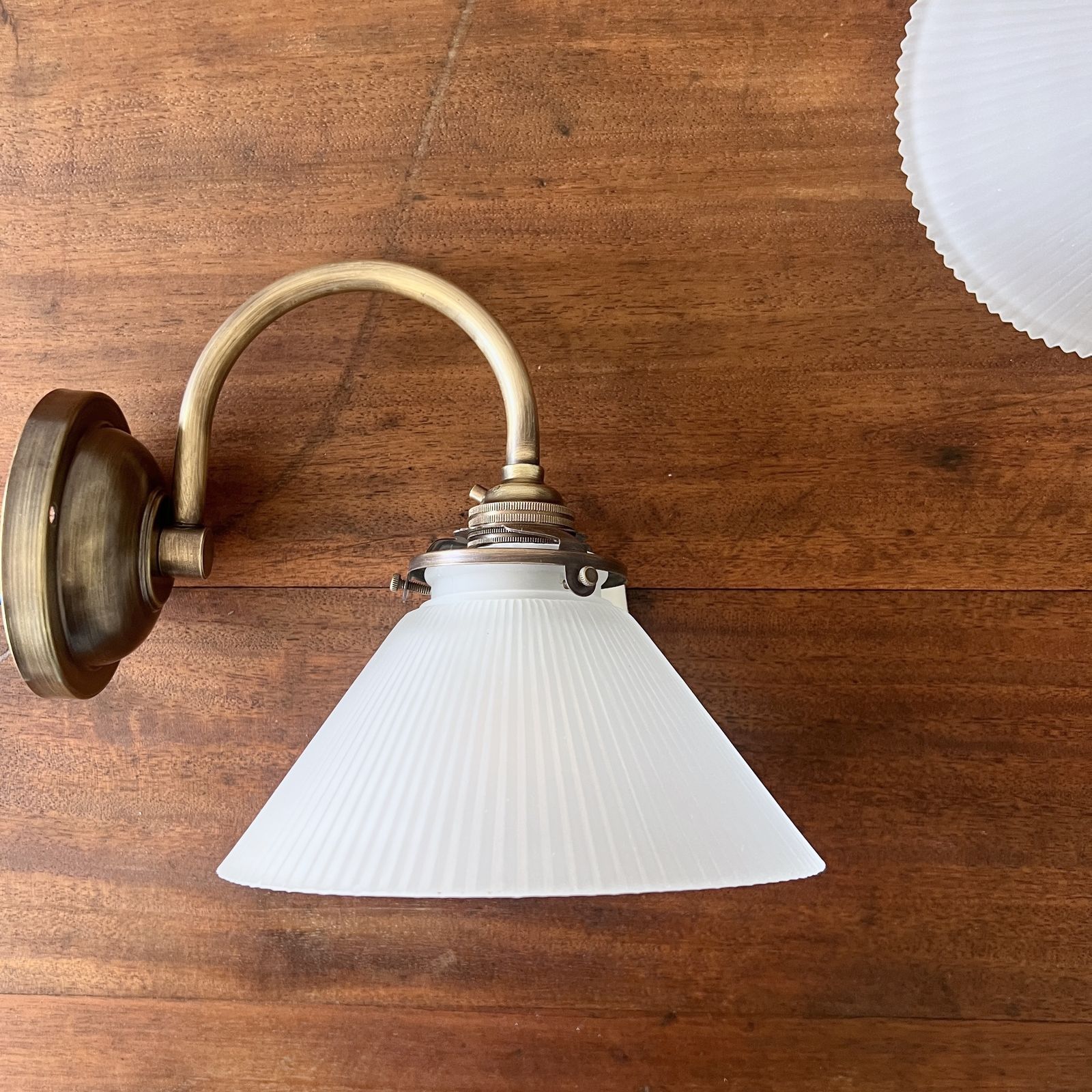 Newly Made Antique Brushed Brass Wall Lights With Contemporary Frosted Conical Shades photo Lighting