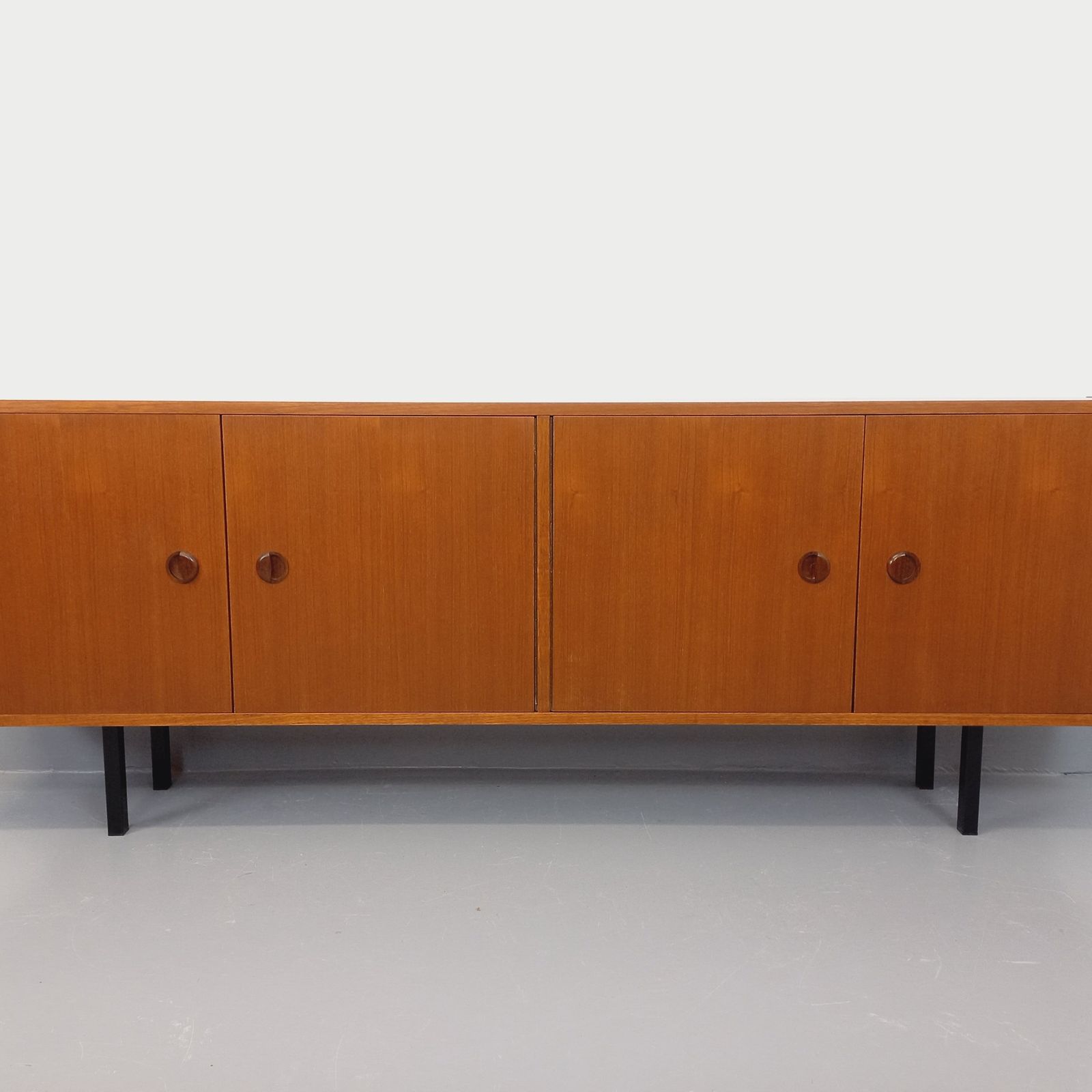 Modernist Sideboard In Teak With Black Metal Legs