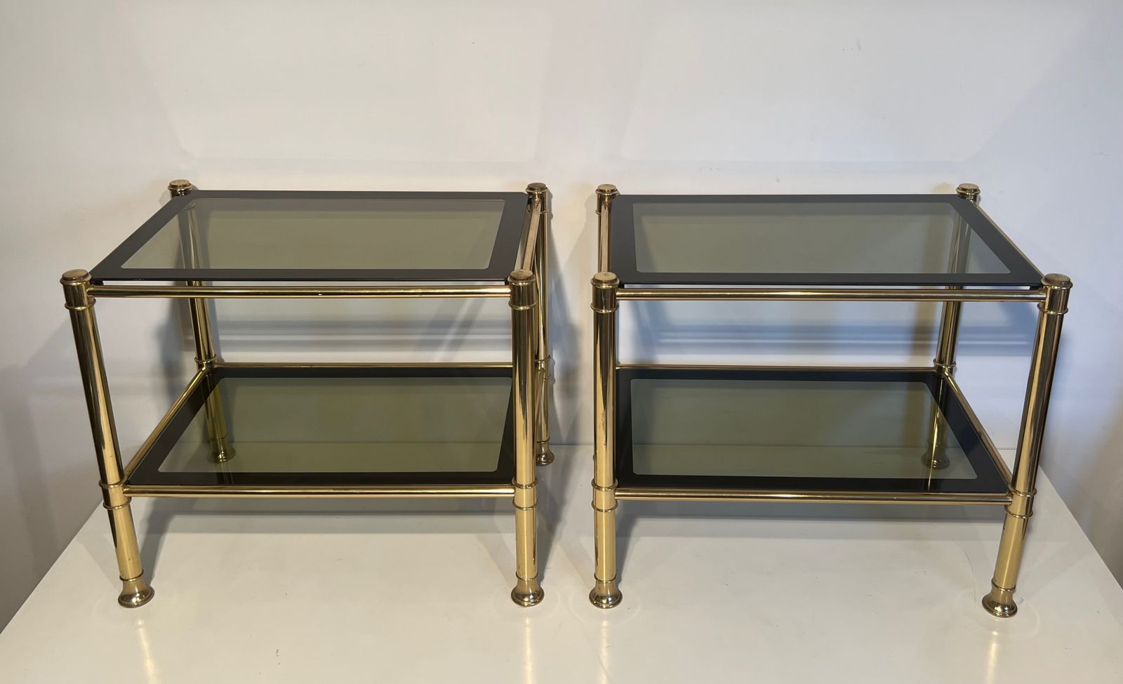 Pair Of Brass End Tables With Smoked Glass Trays. Circa 1970