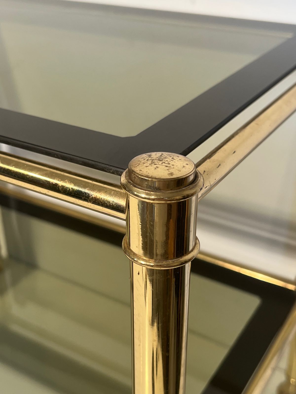 Pair Of Brass End Tables With Smoked Glass Trays. Circa 1970 photo vinterior