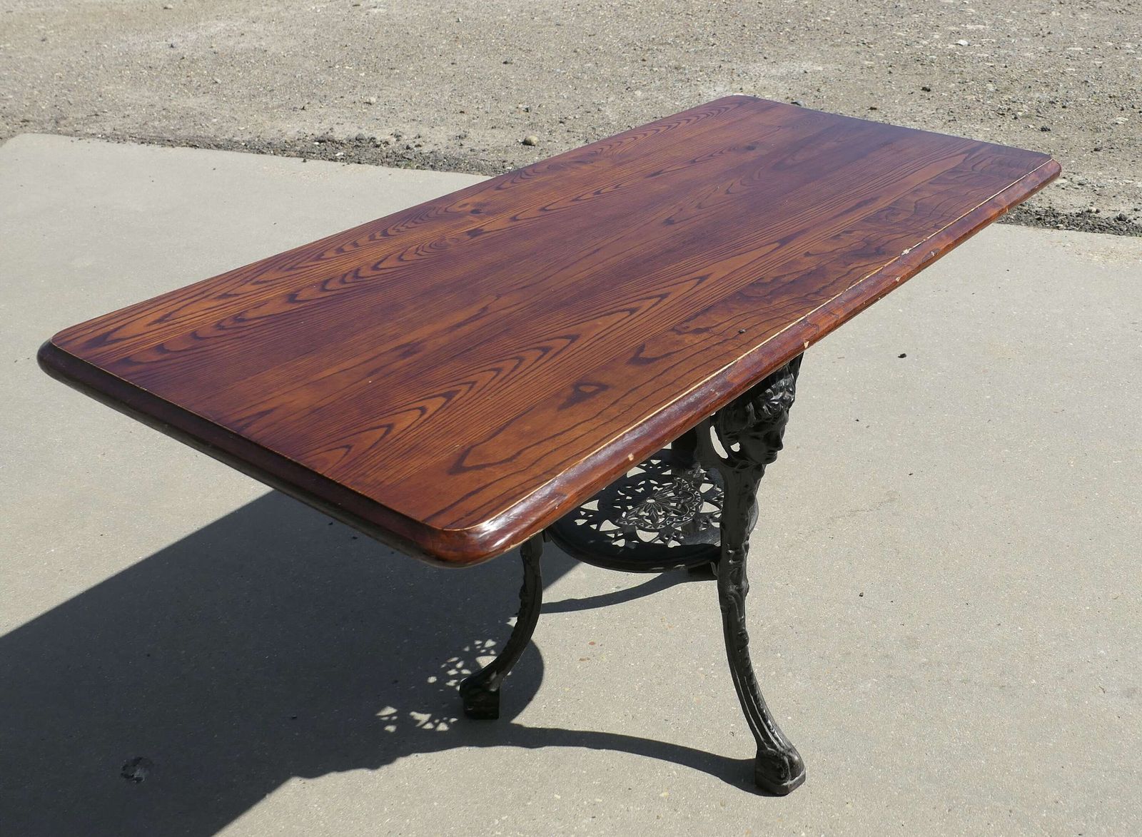 Strong Attractive Cast Iron And Oak Garden Table photo 600.0