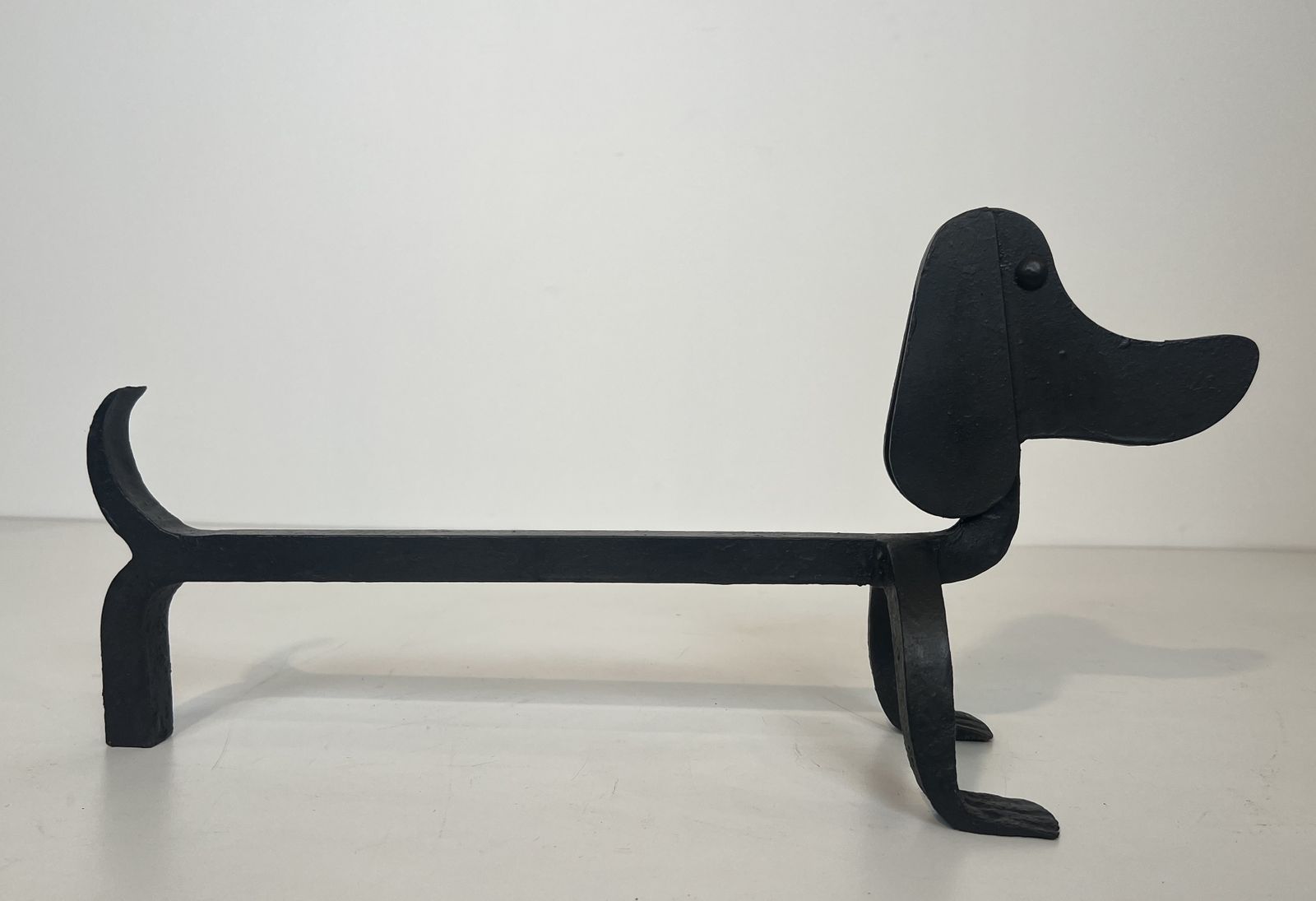Pair Of Wrought Iron Andirons Depicting Dachshunds Attributed To Edouard Schenck photo for sale