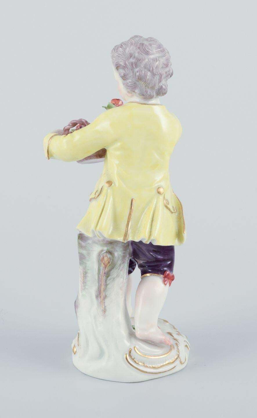 Meissen, Germany. Porcelain Figurine Of Boy With Basket Of Flowers. Ca 1900 photo vinterior