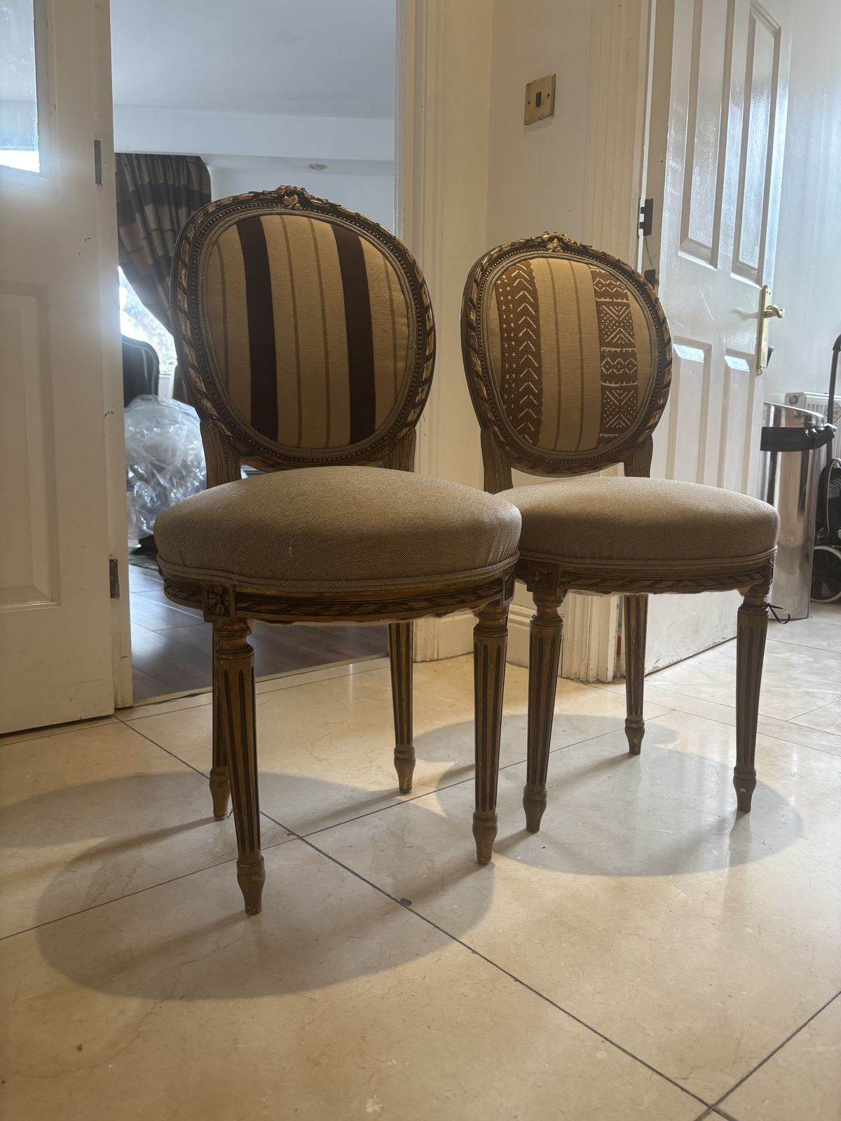 Antique Style Louis XVI Inspired Side Chairs With A Touch Of Nigeria. photo furniture