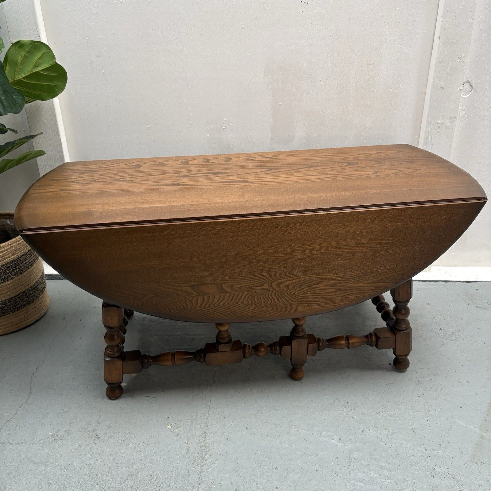 Ercol Trinity Solid Elm 2 Tier Drop Leaf Coffee Table In Golden Dawn