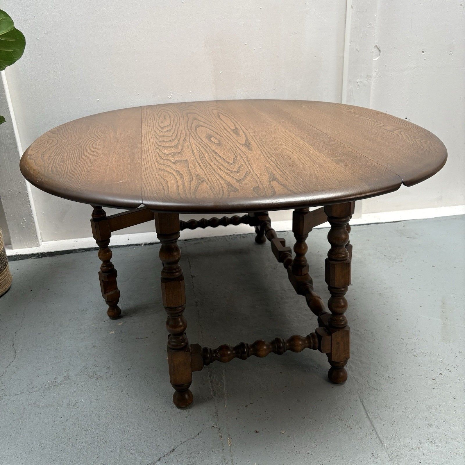 photo buy Ercol Trinity Solid Elm 2 Tier Drop Leaf Coffee Table In Golden Dawn
