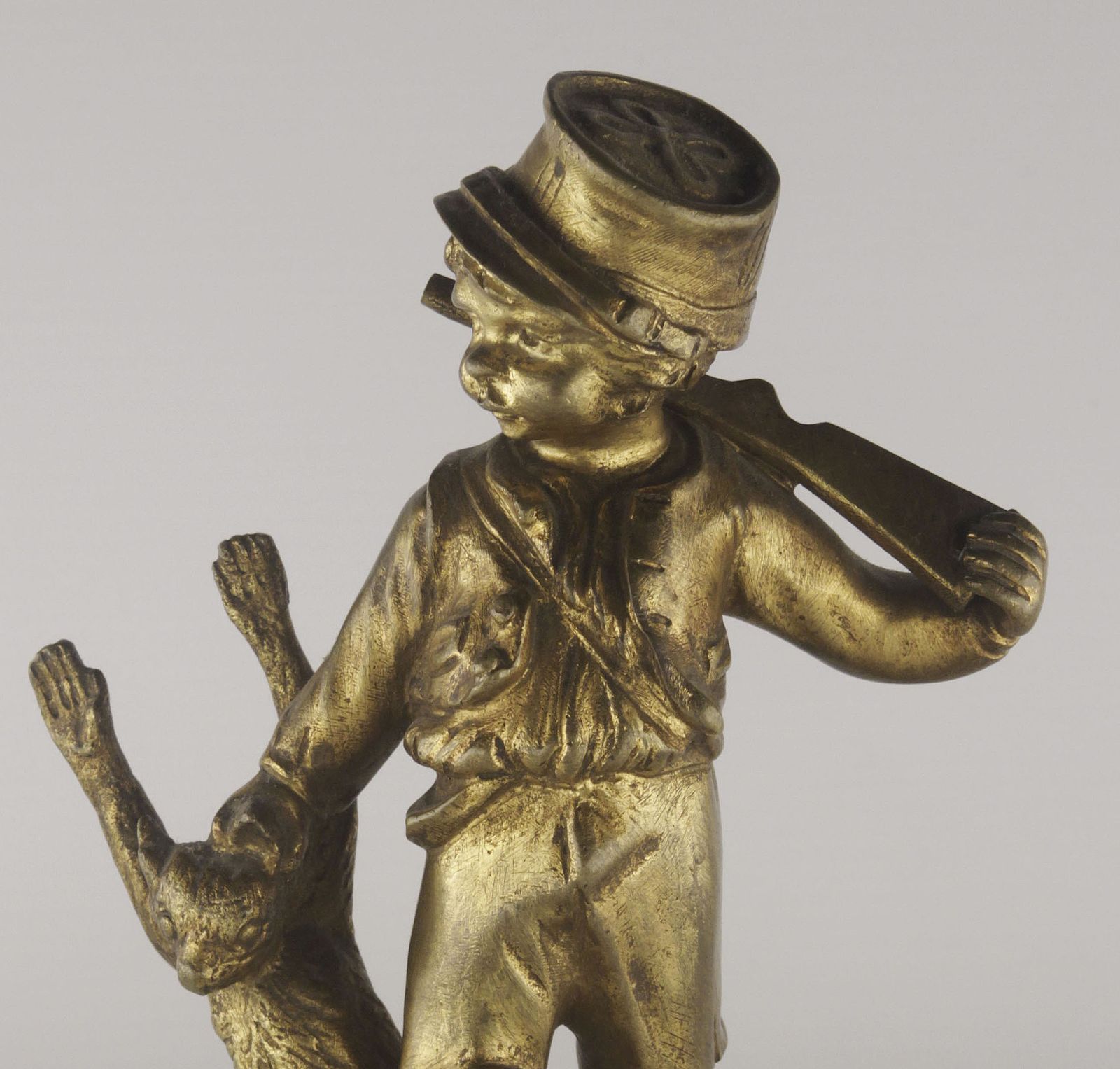 photo furniture Early 20th Century Belle époque French Gilt Bronze Sculpture Of Boy Playing The Hunter Kamarad By Georges Flamand