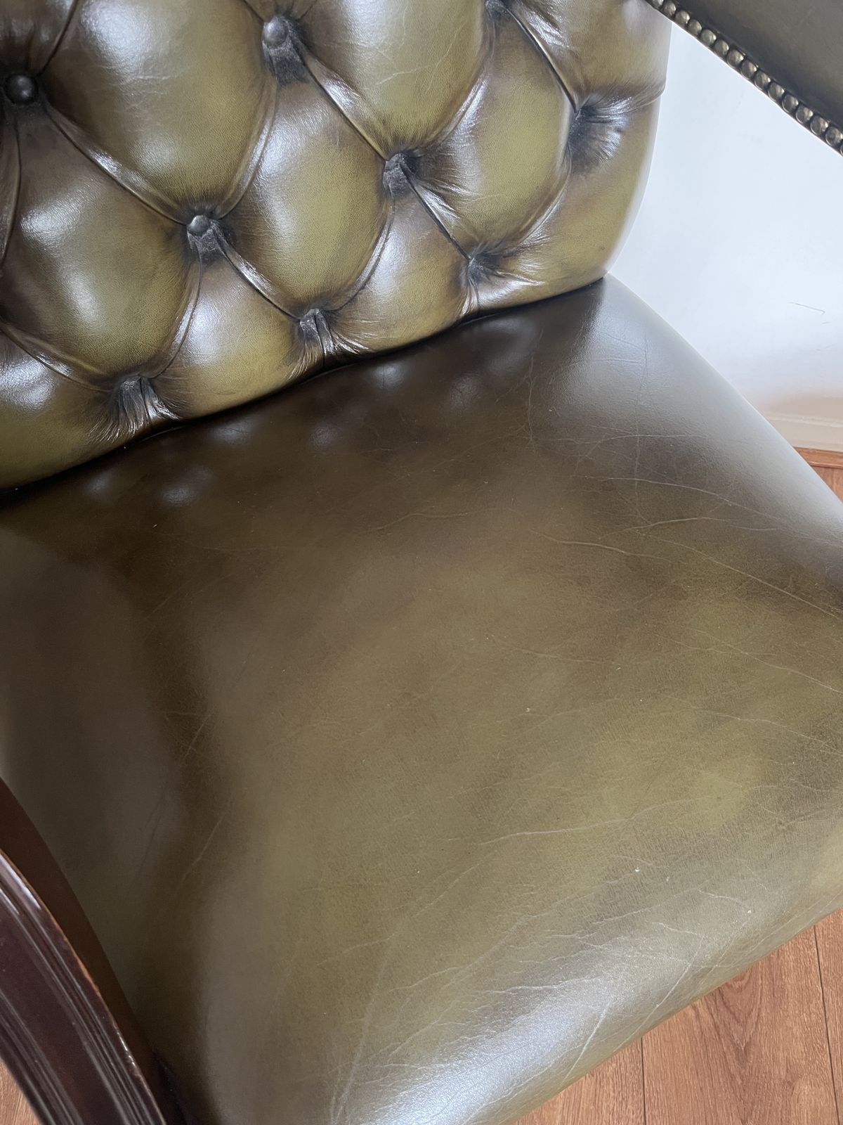 Exceptional Vintage Dark Green Leather Gainsborough Carver Armchair With Classic Chesterfield Buttoning photo for sale