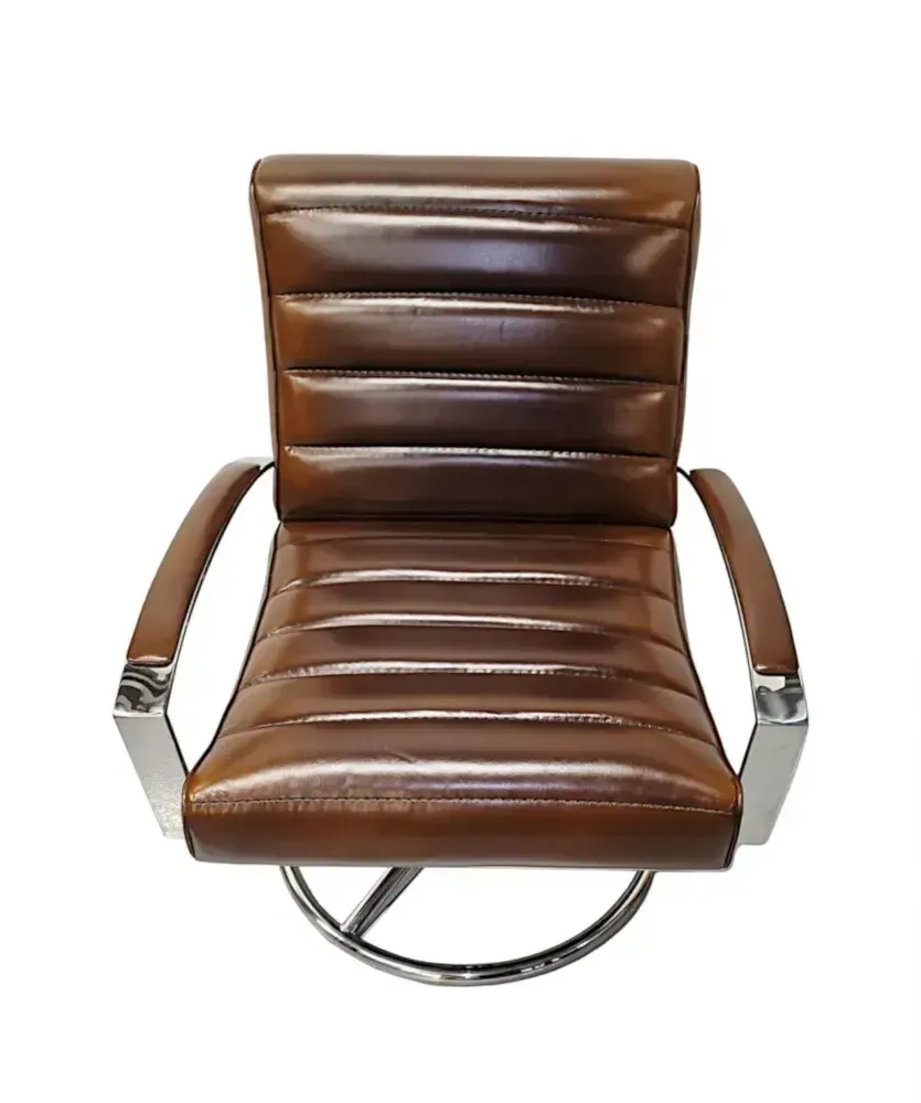 A Stunning Mid Century Style Leather And Chrome Revolving Armchair photo for sale