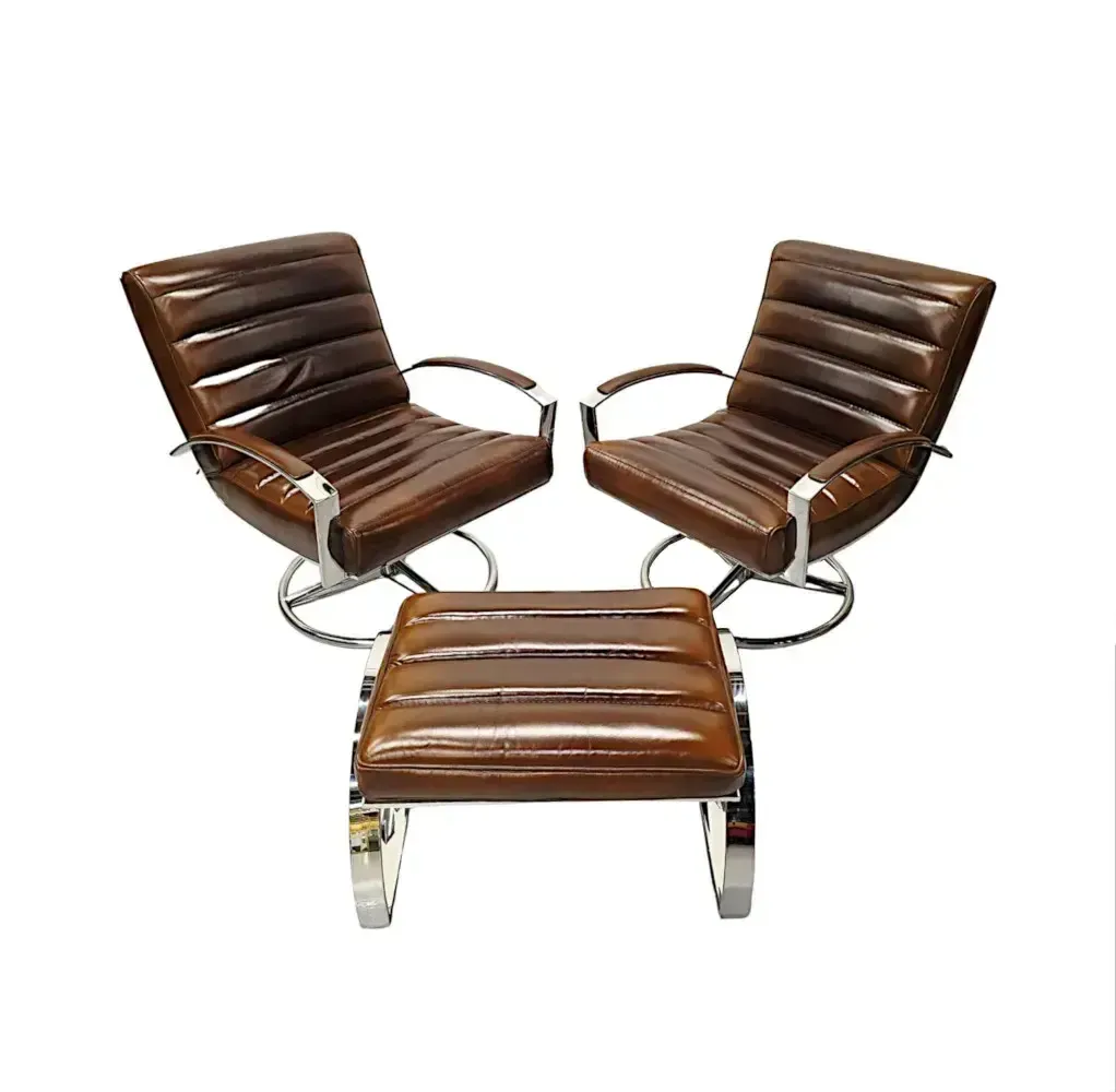 A Stunning Mid Century Style Leather And Chrome Revolving Armchair photo vinterior