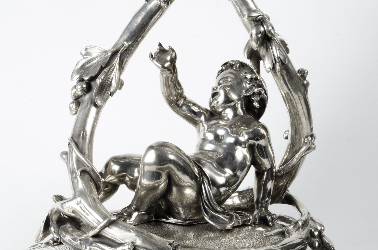 Late 19th Century Christofle Rococo Revival Silvered Metal Decorative Centerpiece Of Reclining Child With Baccarat Cut Crystal Compote Bowls, France photo for sale