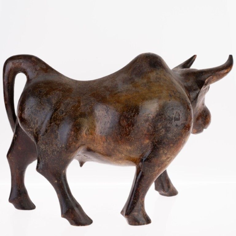 Wooden Sculpture Of A Bull photo furniture