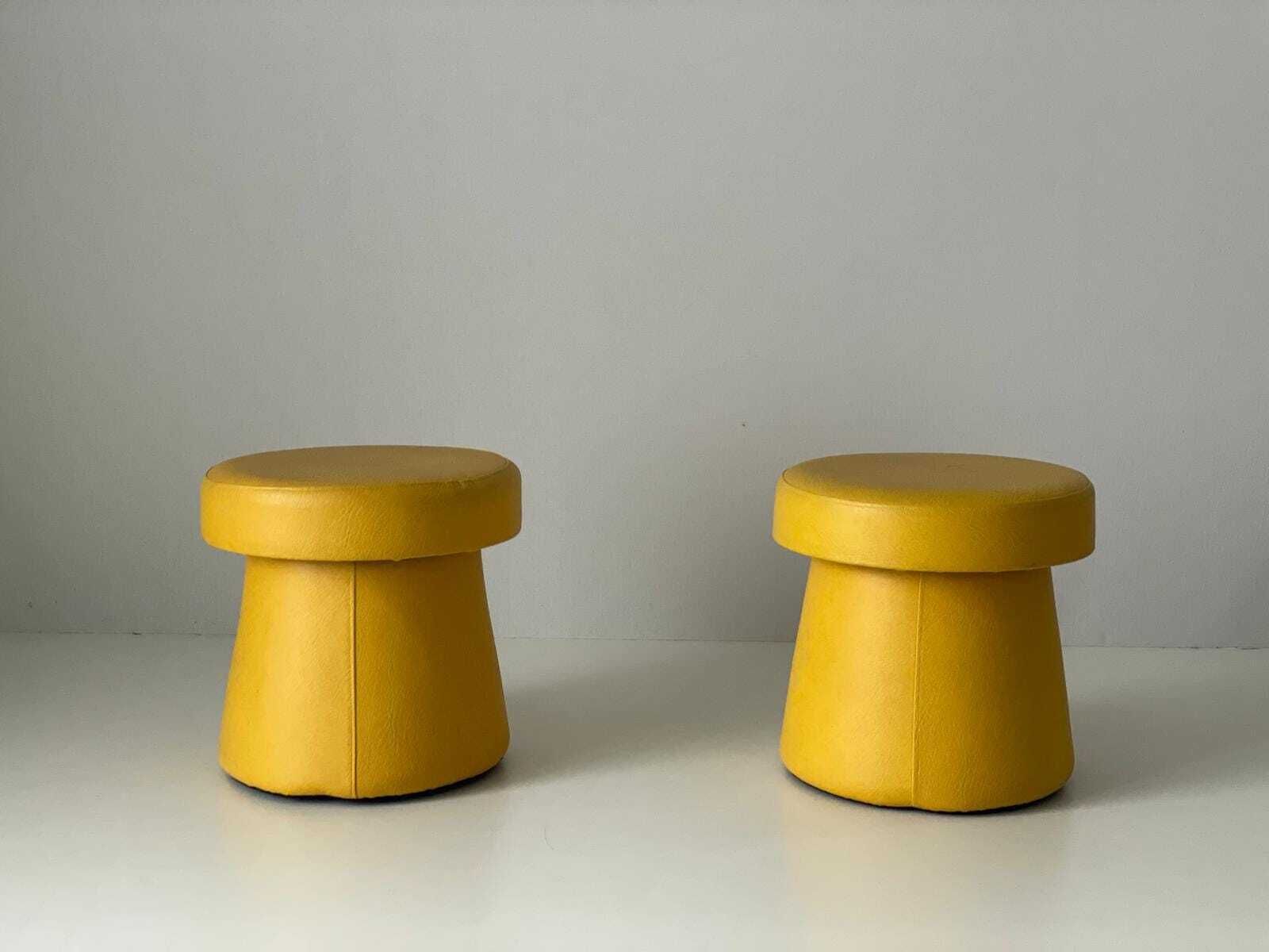 photo furniture Yellow Faux Leather Pair Of Pouf Stools With Hidden Storage Space