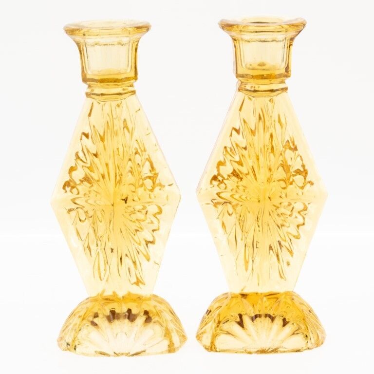 Antique Pair Of Art Deco Pressed Amber Glass Candlesticks