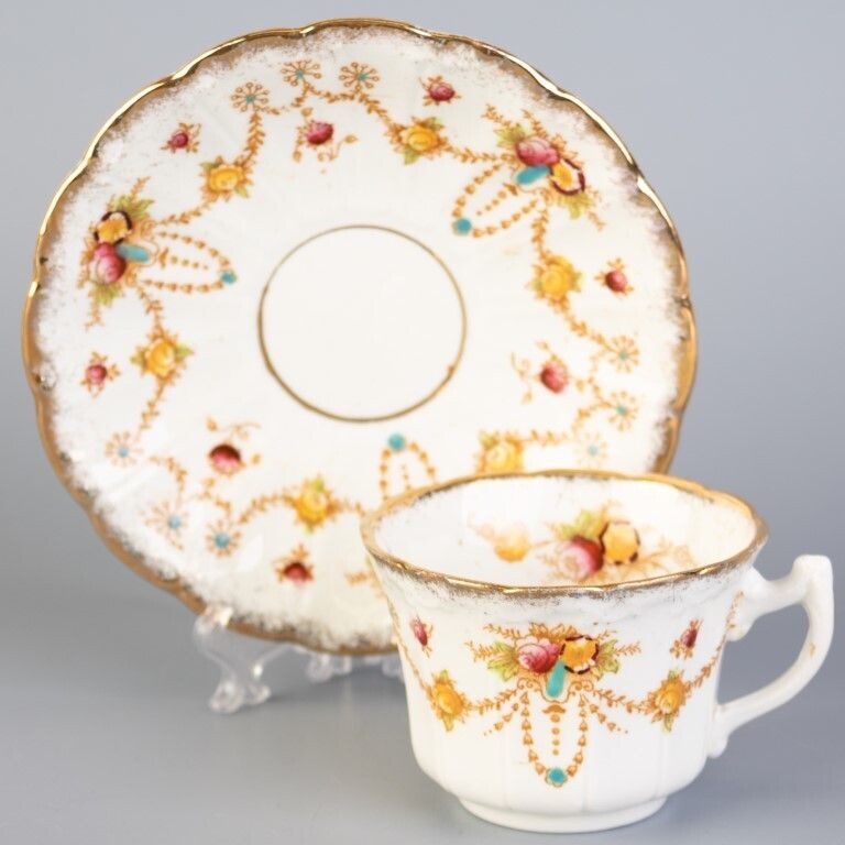 Antique Art Nouveau Bow Porcelain Ceramic Teacup & Saucer