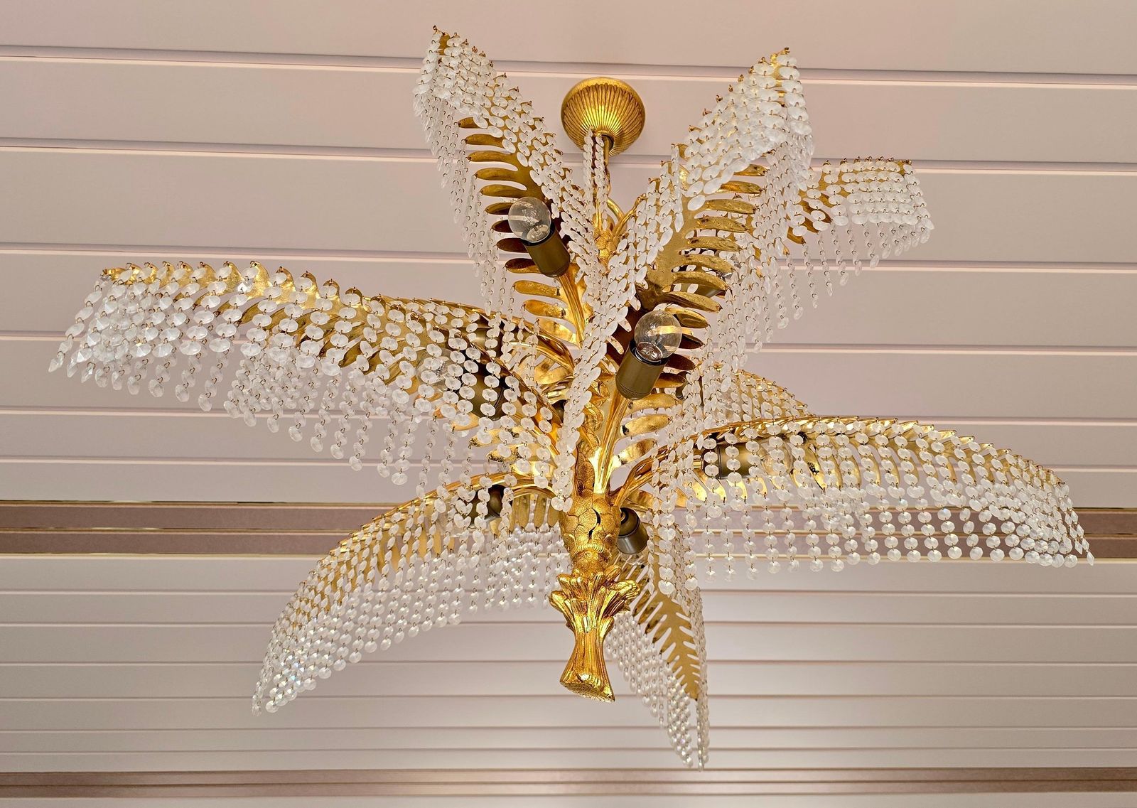 A Hollywood Regency French Palm Tree Gilt Bronze And Crystal Chandelier photo for sale