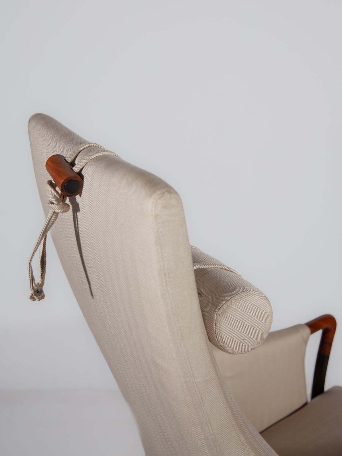 photo buy Set Of Two Highback Lounge Chairs And Footstool By Umberto Asnago, 1980
