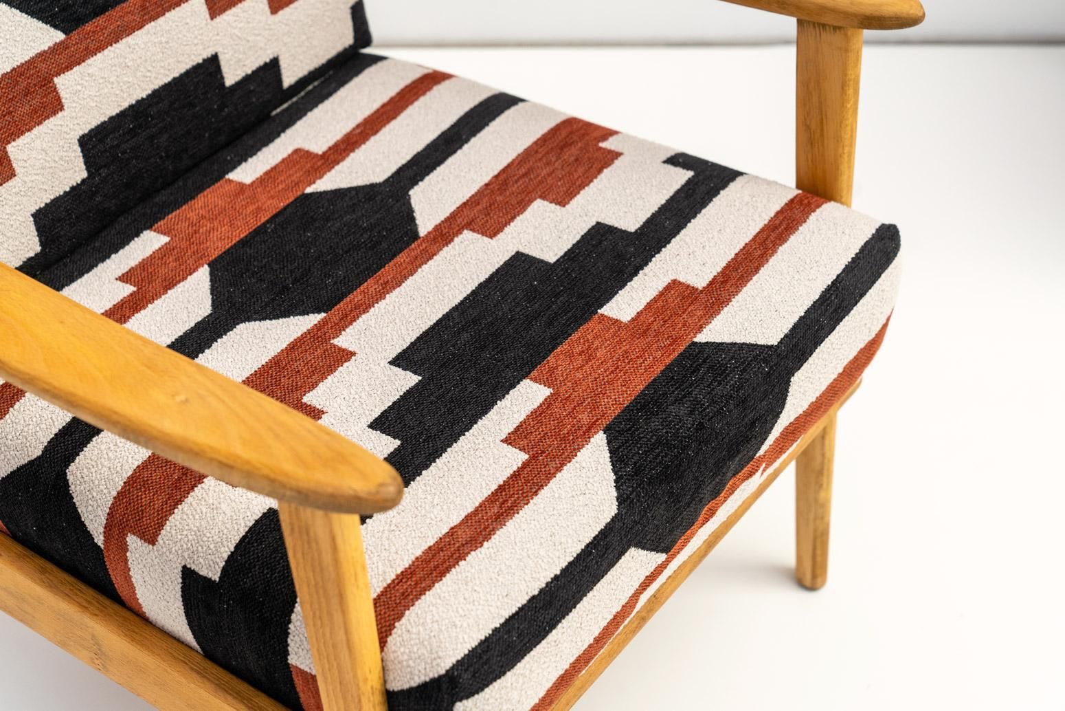 Pair Of Armchairs In Bold Geometric Reupholstery photo vinterior