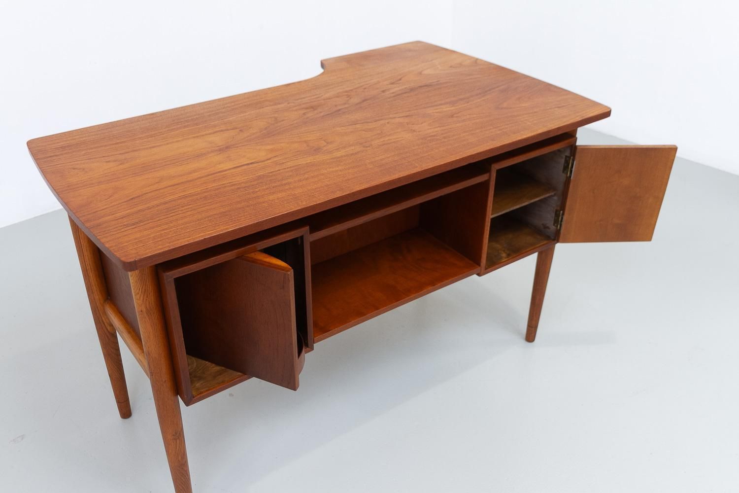 Furniture Danish Mid Century Modern Asymmetrical Teak Desk, 1950s. photo