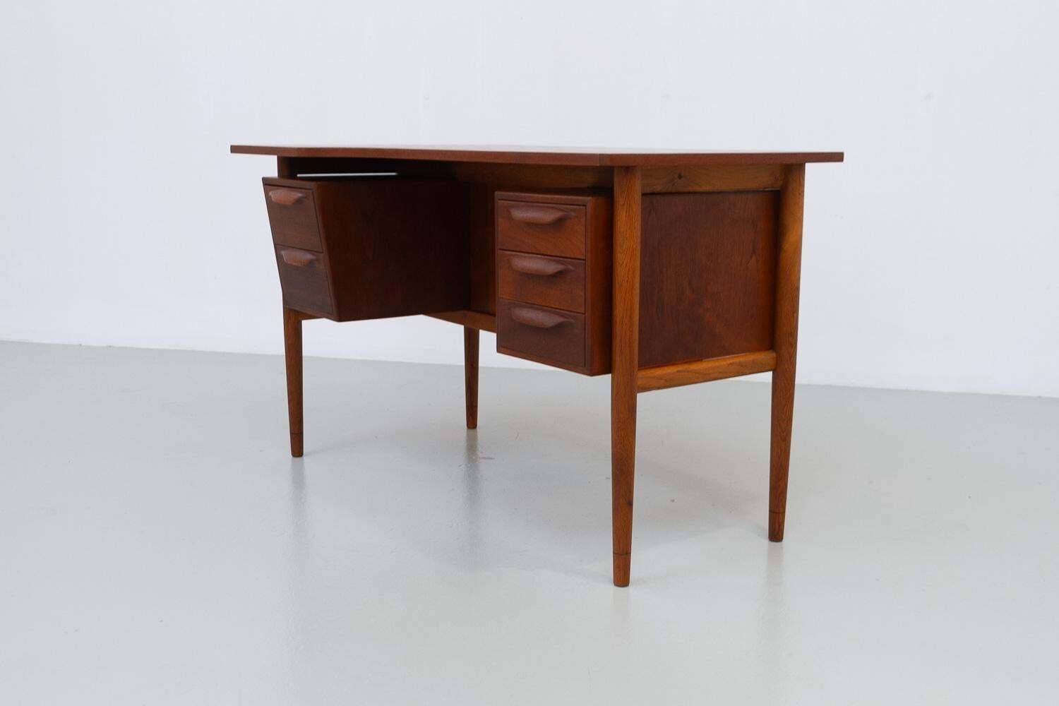 photo buy Danish Mid Century Modern Asymmetrical Teak Desk, 1950s.