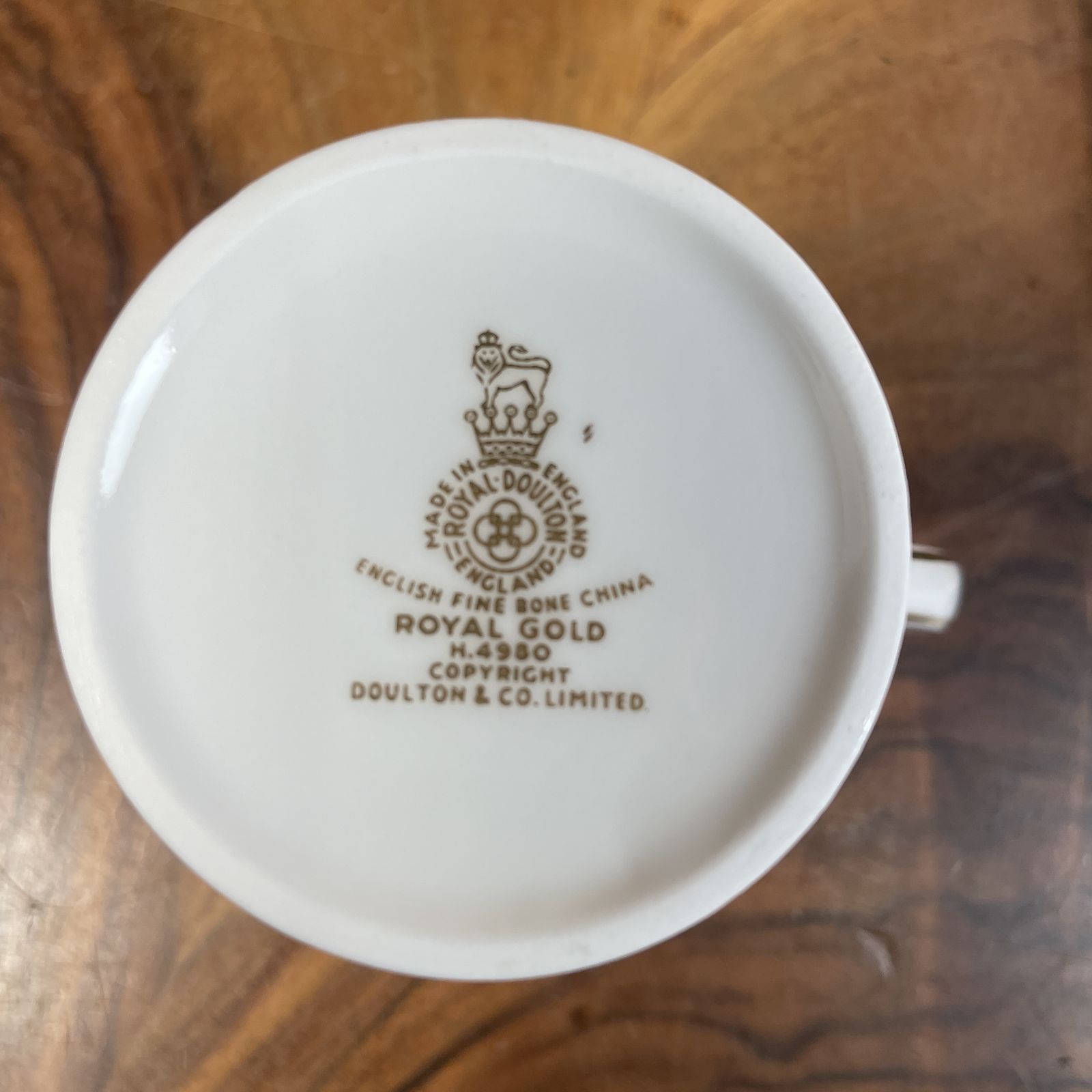 A Set Of 9 Coffee Cups And Saucers photo for sale