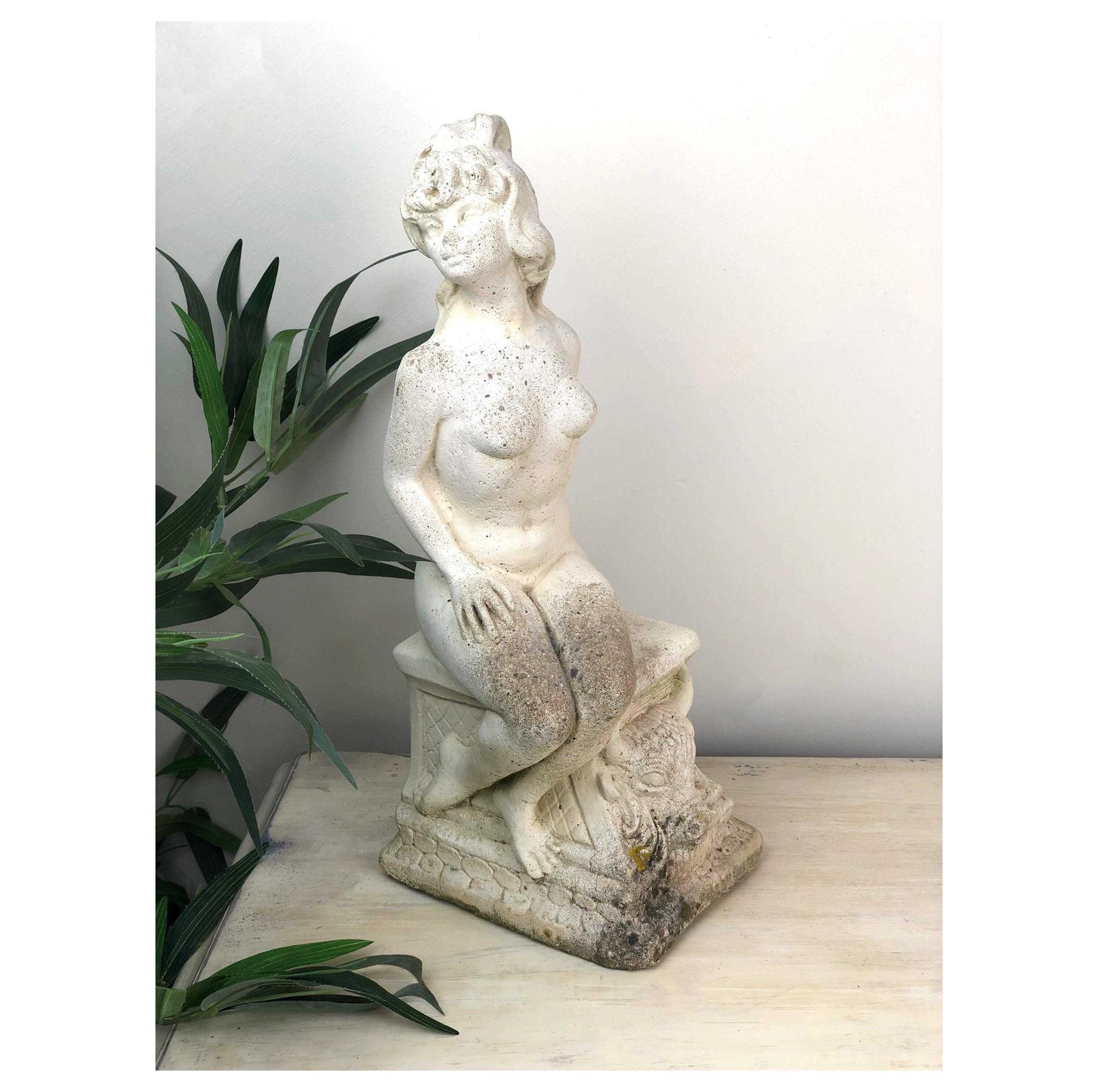 Vintage Stone Greek/Roman Goddess Small Statue Vintage White Stone Seated Aphrodite Or Venus Statue White Composite Stone Female Nude Statue photo for sale