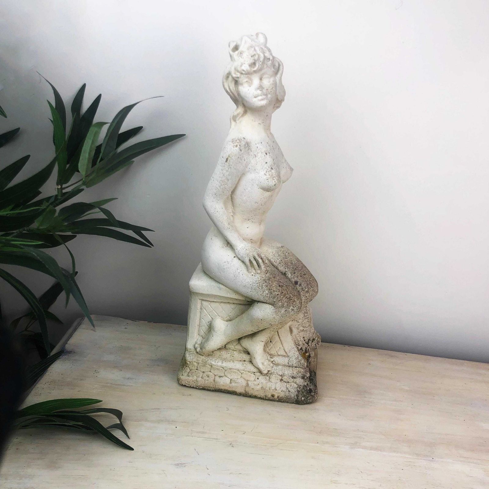 Vintage Stone Greek/Roman Goddess Small Statue Vintage White Stone Seated Aphrodite Or Venus Statue White Composite Stone Female Nude Statue photo vintage