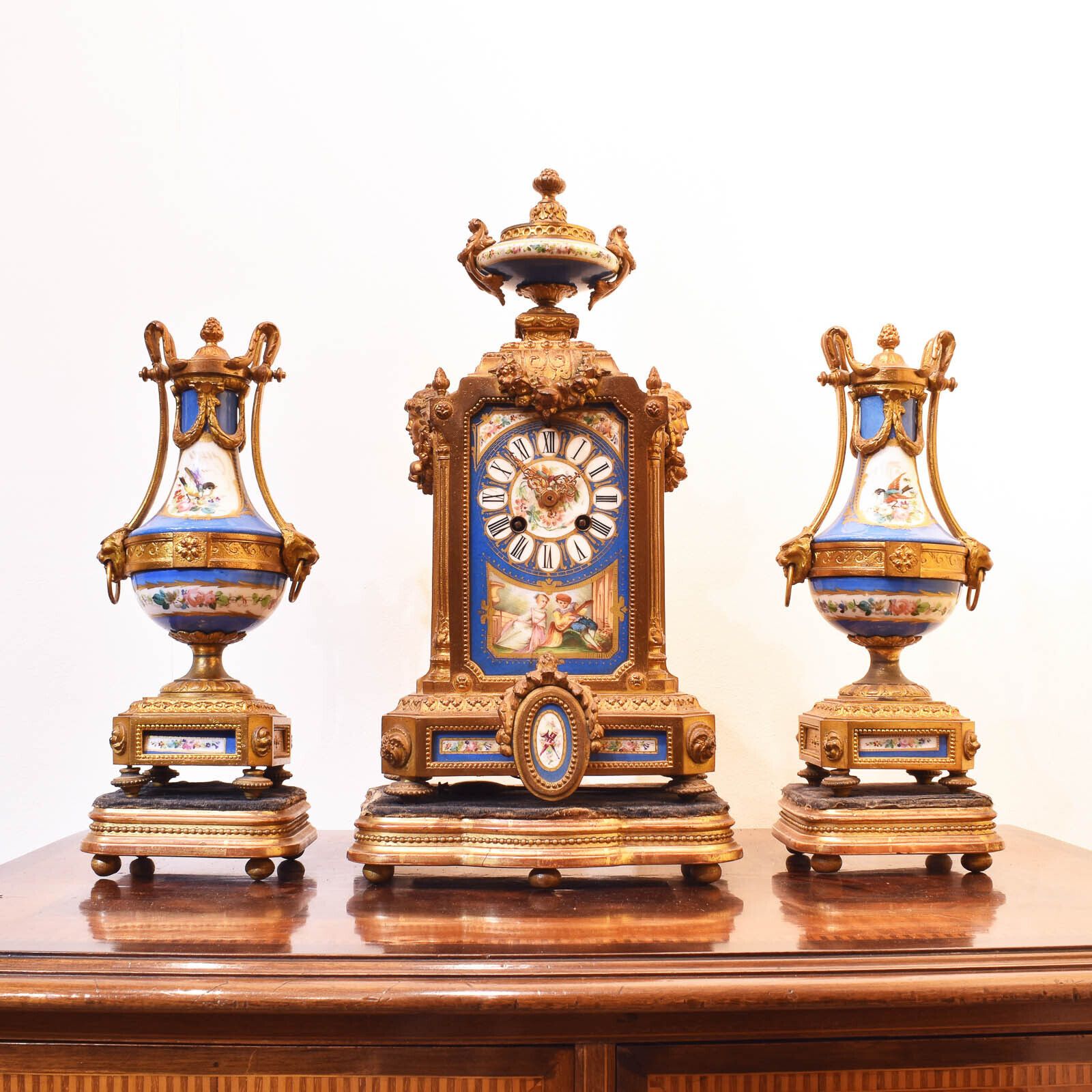 Sevres Panelled Clock With Garnitures photo furniture