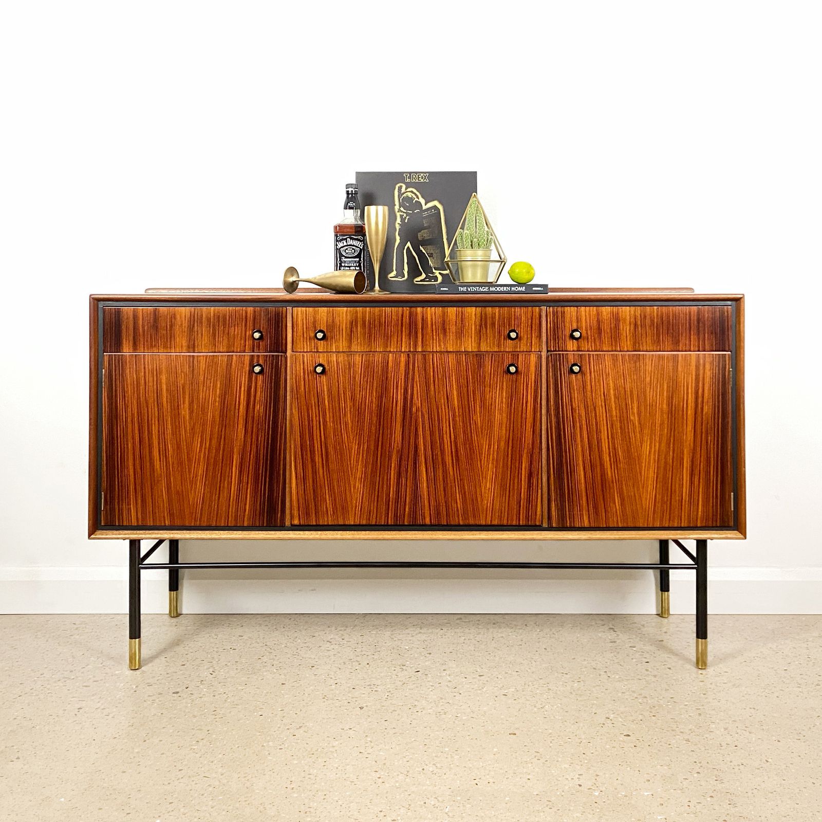 Mid Century Cocktail Bar Drinks Cabinet By Heal's In Rosewood And Brass With Black & Gold Jackson Pollock Paint Effect photo for sale
