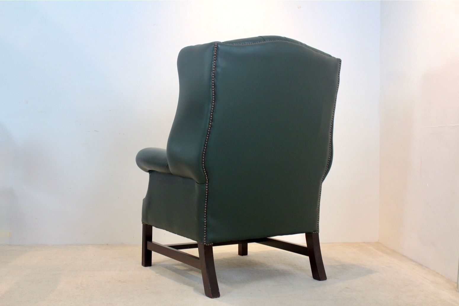 Classic Chesterfield Wingback Armchair With Footstool In Green Leather photo 581.0