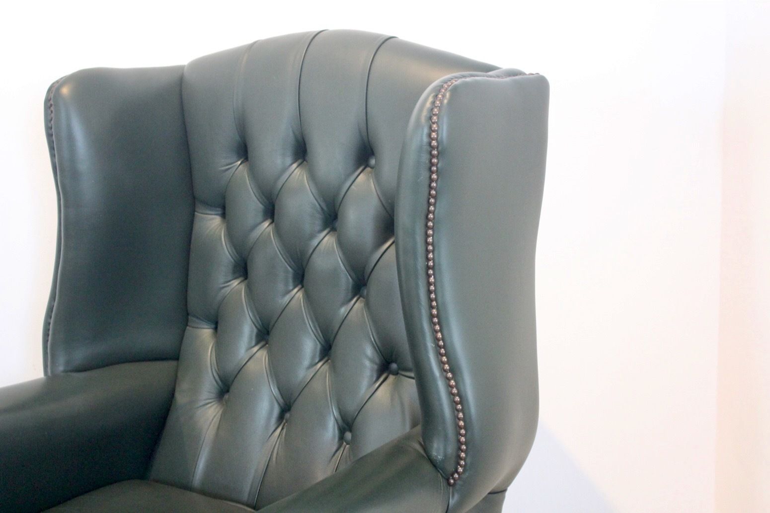 Classic Chesterfield Wingback Armchair With Footstool In Green Leather photo buy
