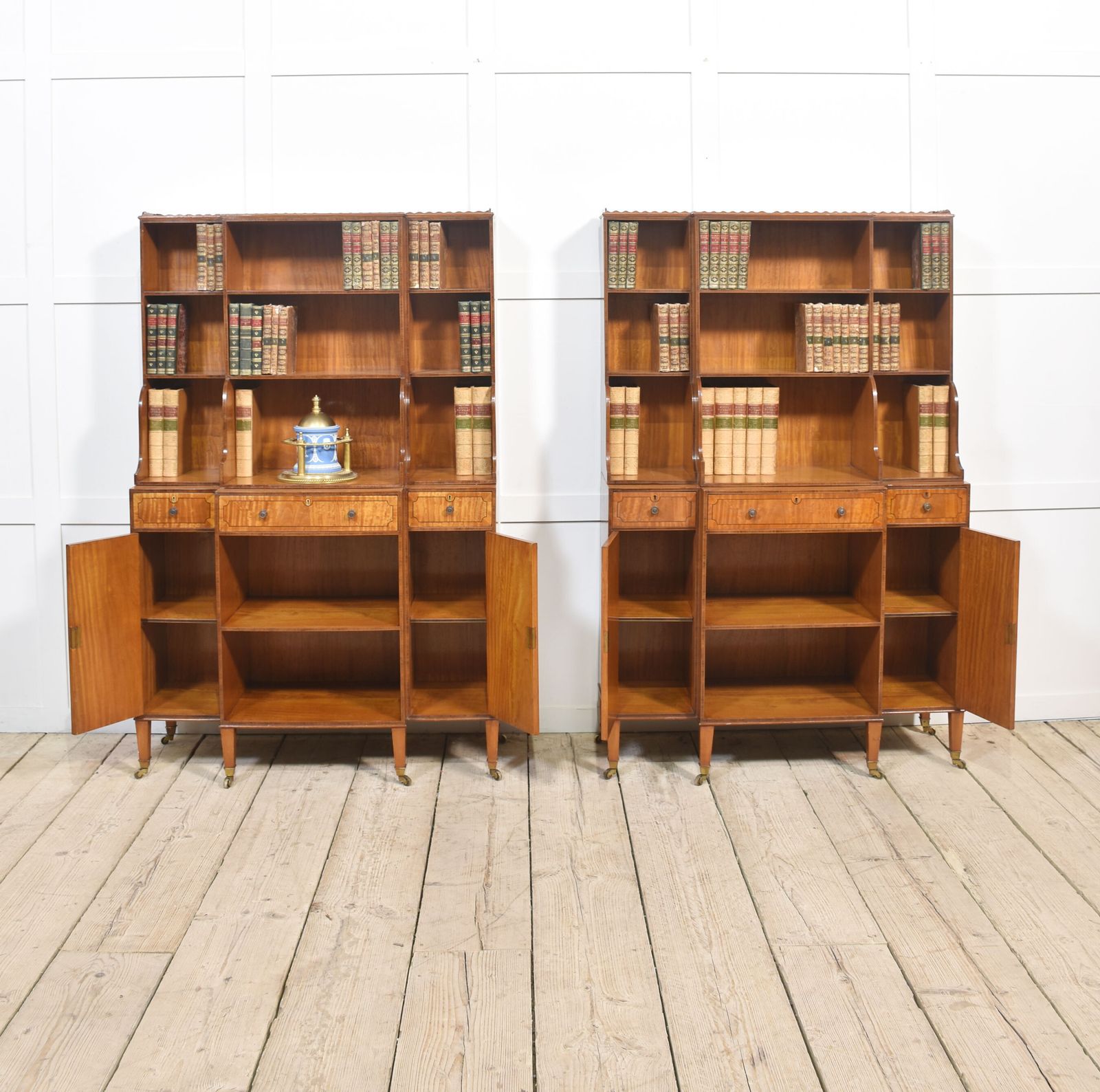 Pair Of Satinwood Crossbanded Open Breakfront Waterfall Bookcases