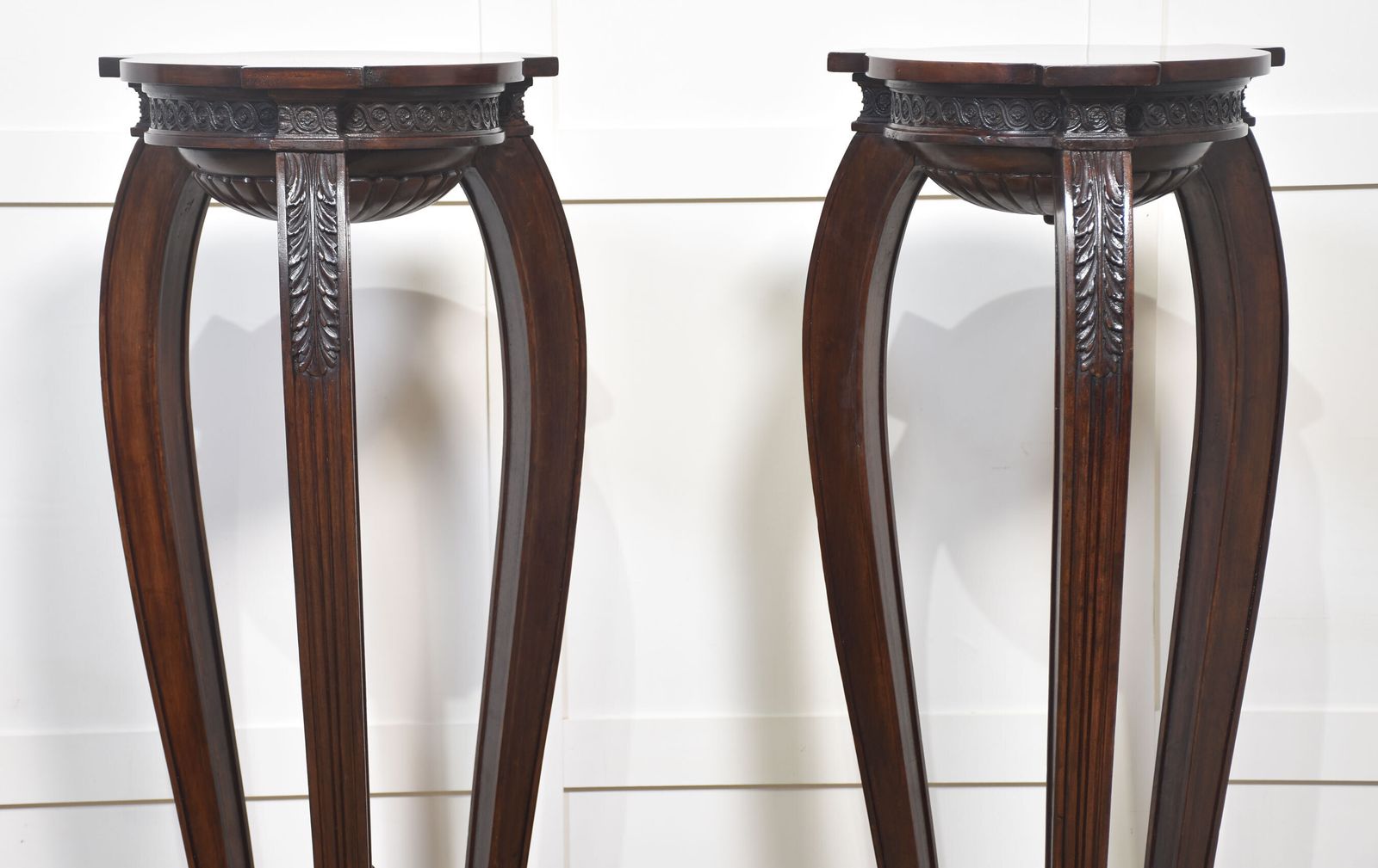 photo for sale Pair Of Carved Mahogany Stands
