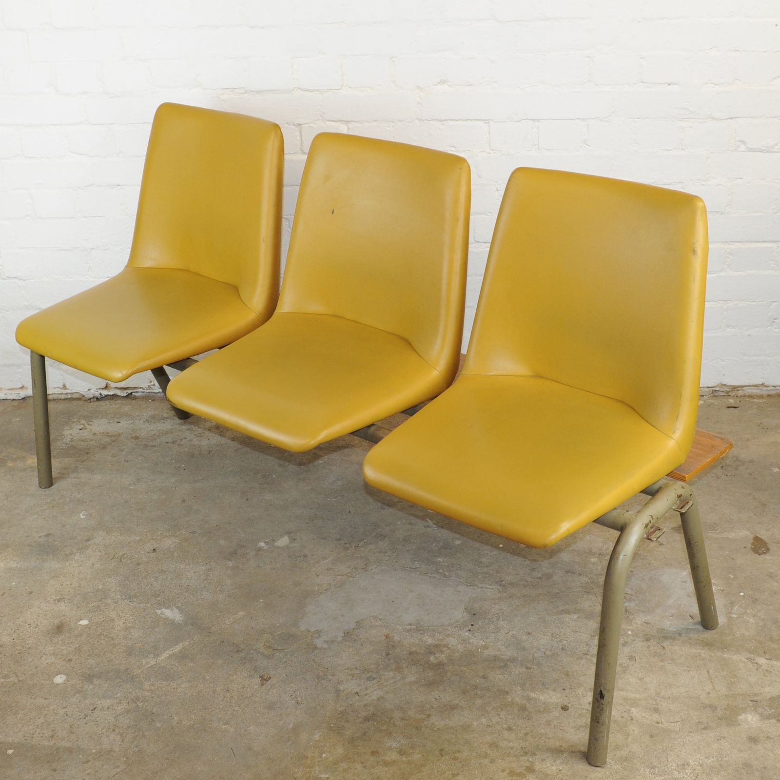 Conjoined Yellow Vinyl Chairs On Black Legs, Set Of 3, 1980s photo furniture