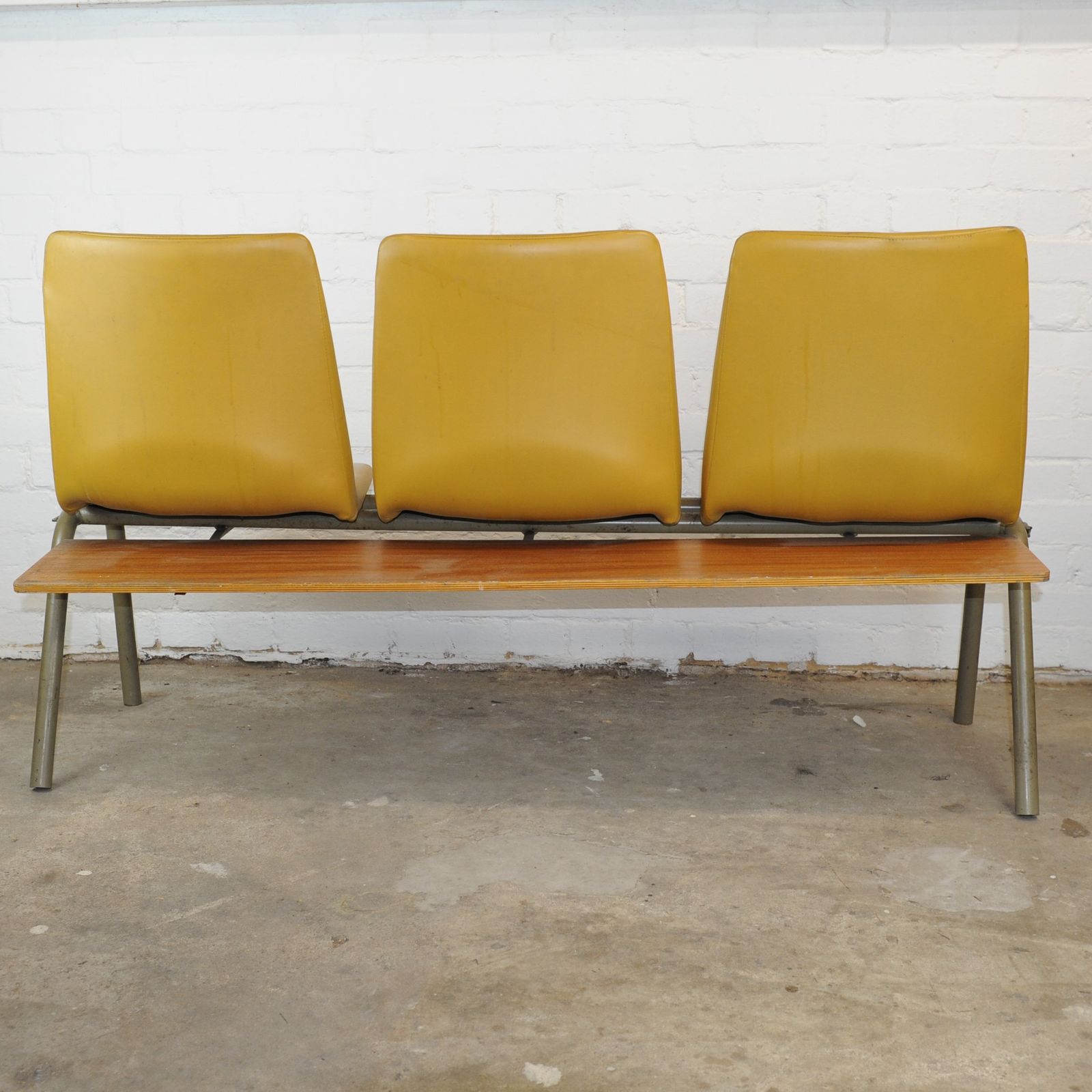 Conjoined Yellow Vinyl Chairs On Black Legs, Set Of 3, 1980s photo vintage