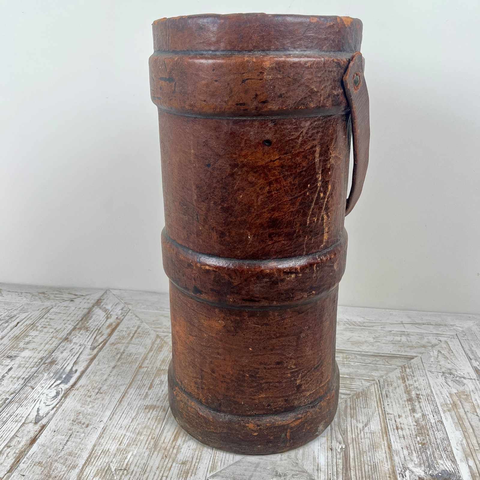 A Large First World War Leather Shell Carrier Stick Stand photo furniture