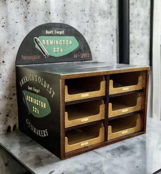 Set Of Shop Drawers. Advertising Cabinet. Remington Shop Counter Cabinet. photo 656.0