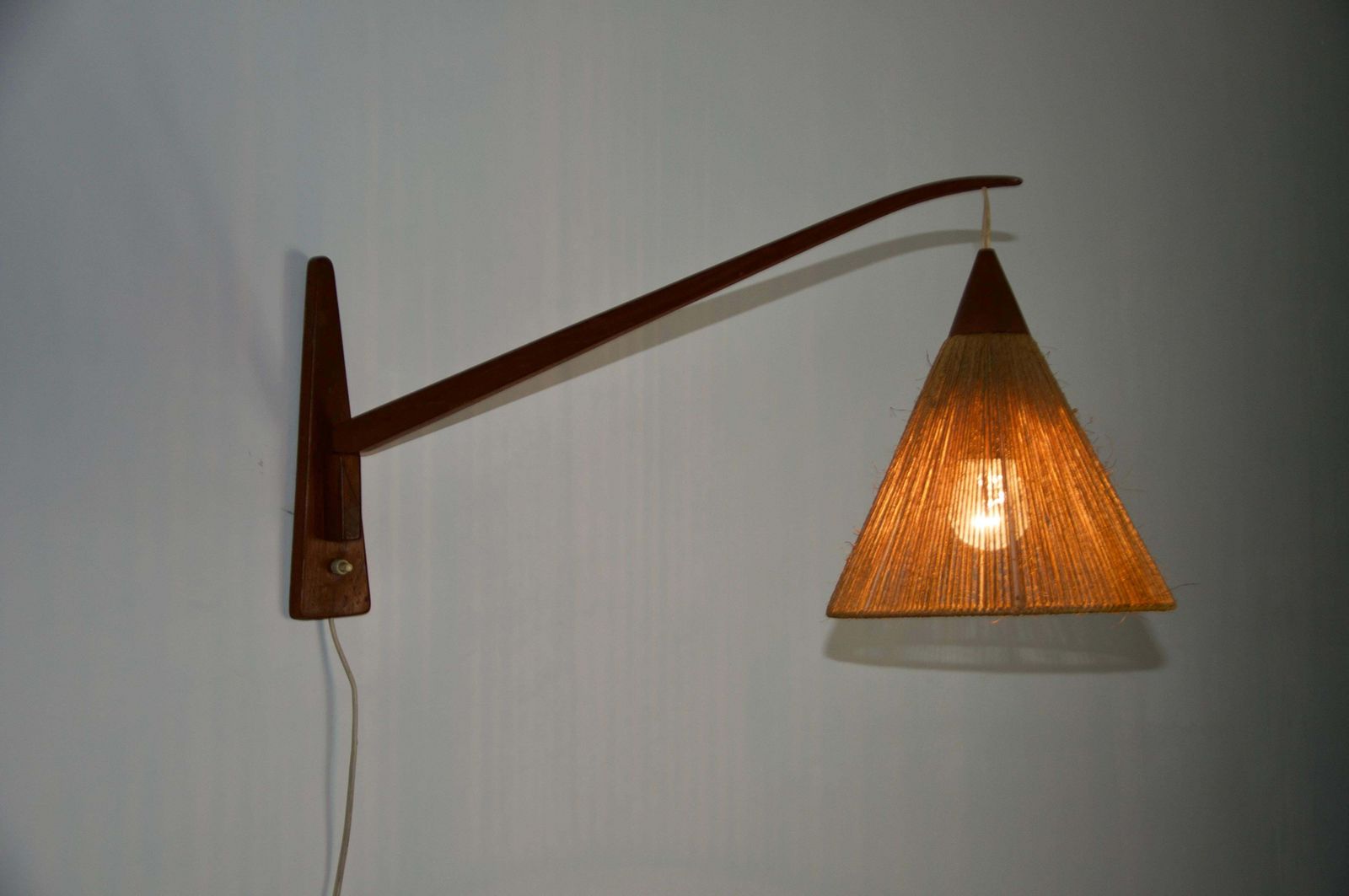 Mid Century Teak And Rattan Swing Arm Wall Lamp By Temde, Swiss, 1960s photo vintage