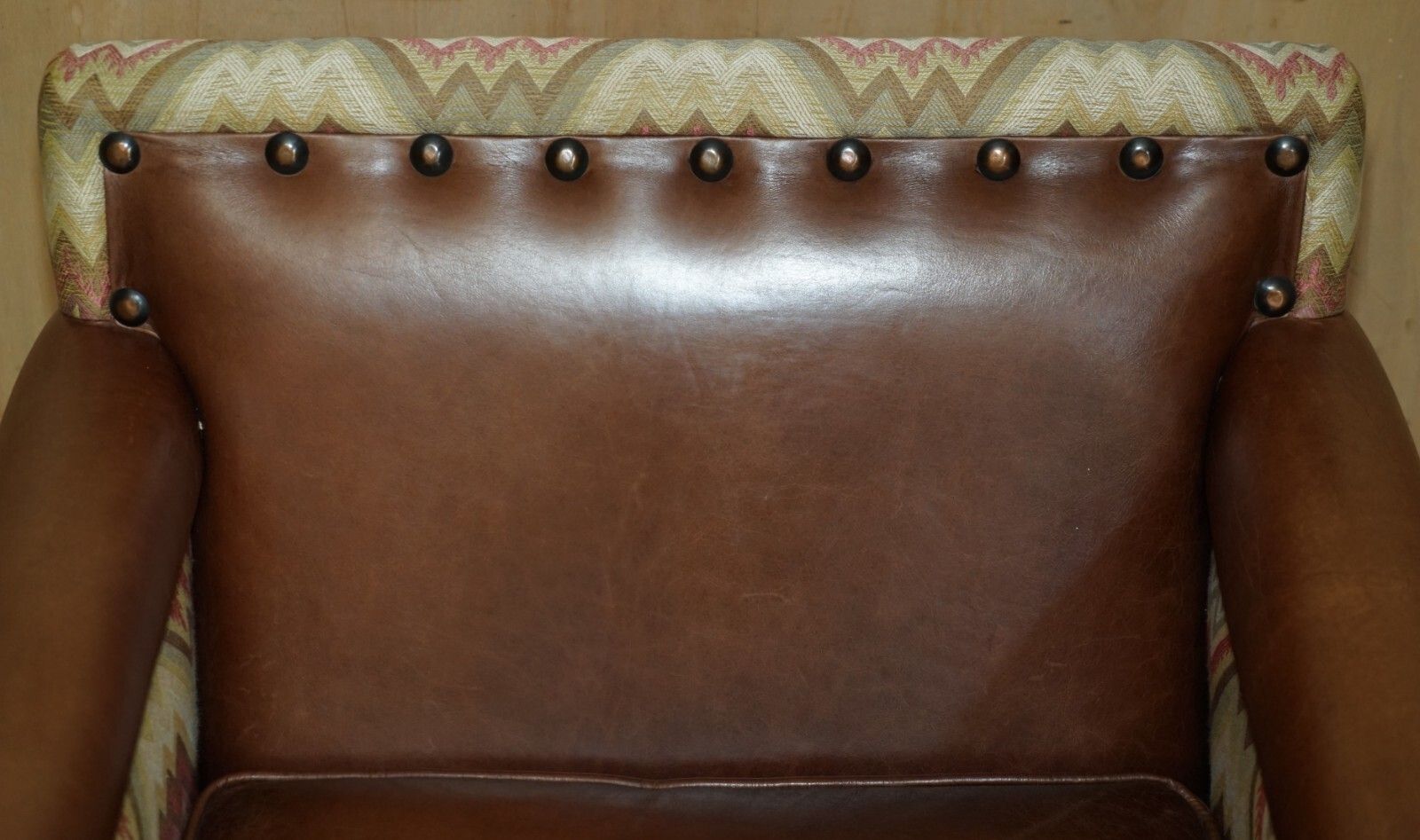 photo furniture Pair Of Andrew Martin Marlborough Brown Leather Reversible Kilim Armchairs