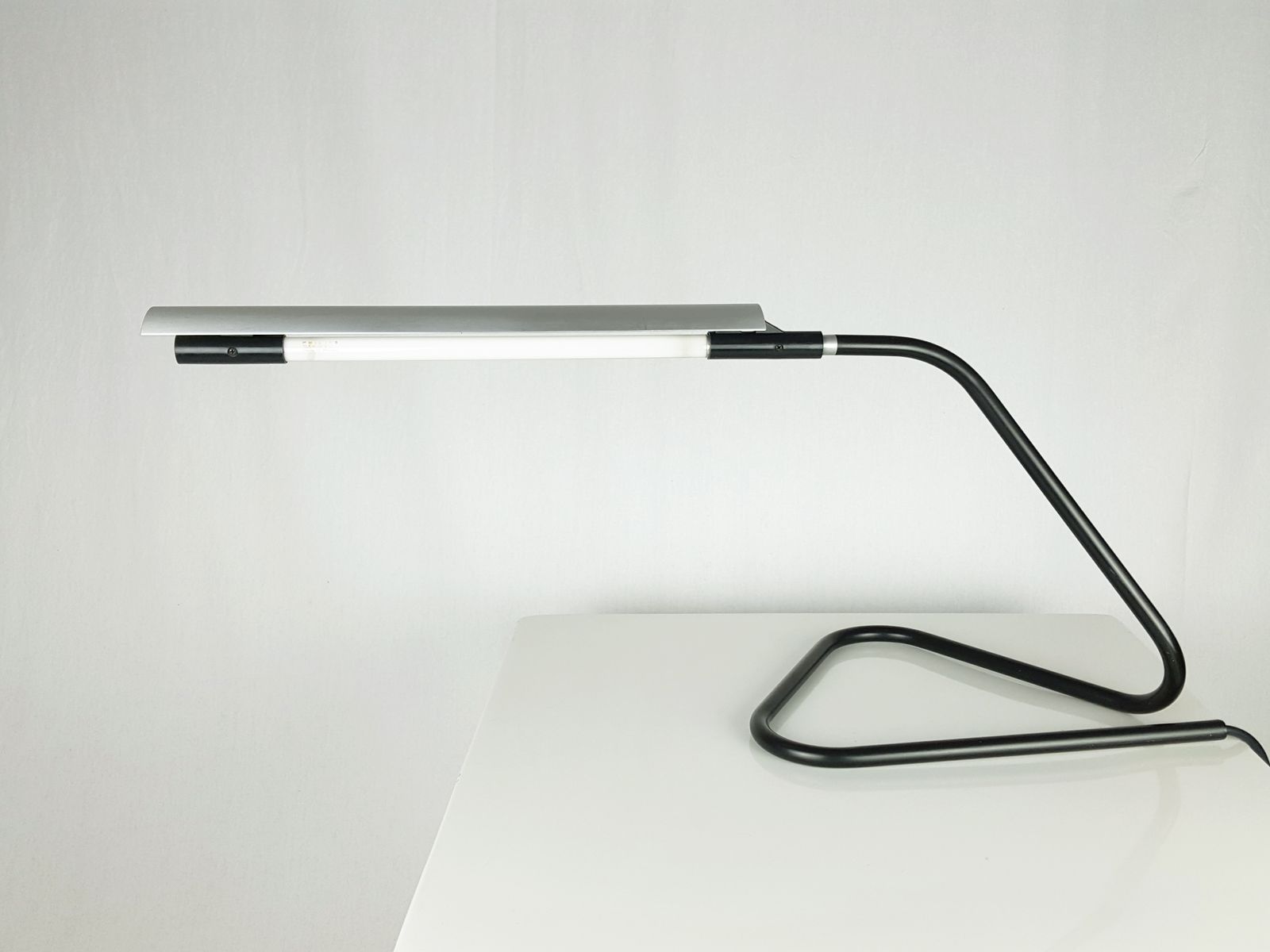 Black Metal And Aluminum Tubino Table Lamp By Achille & Pier Giacomo Castiglioni For Flos, 1970s photo vintage