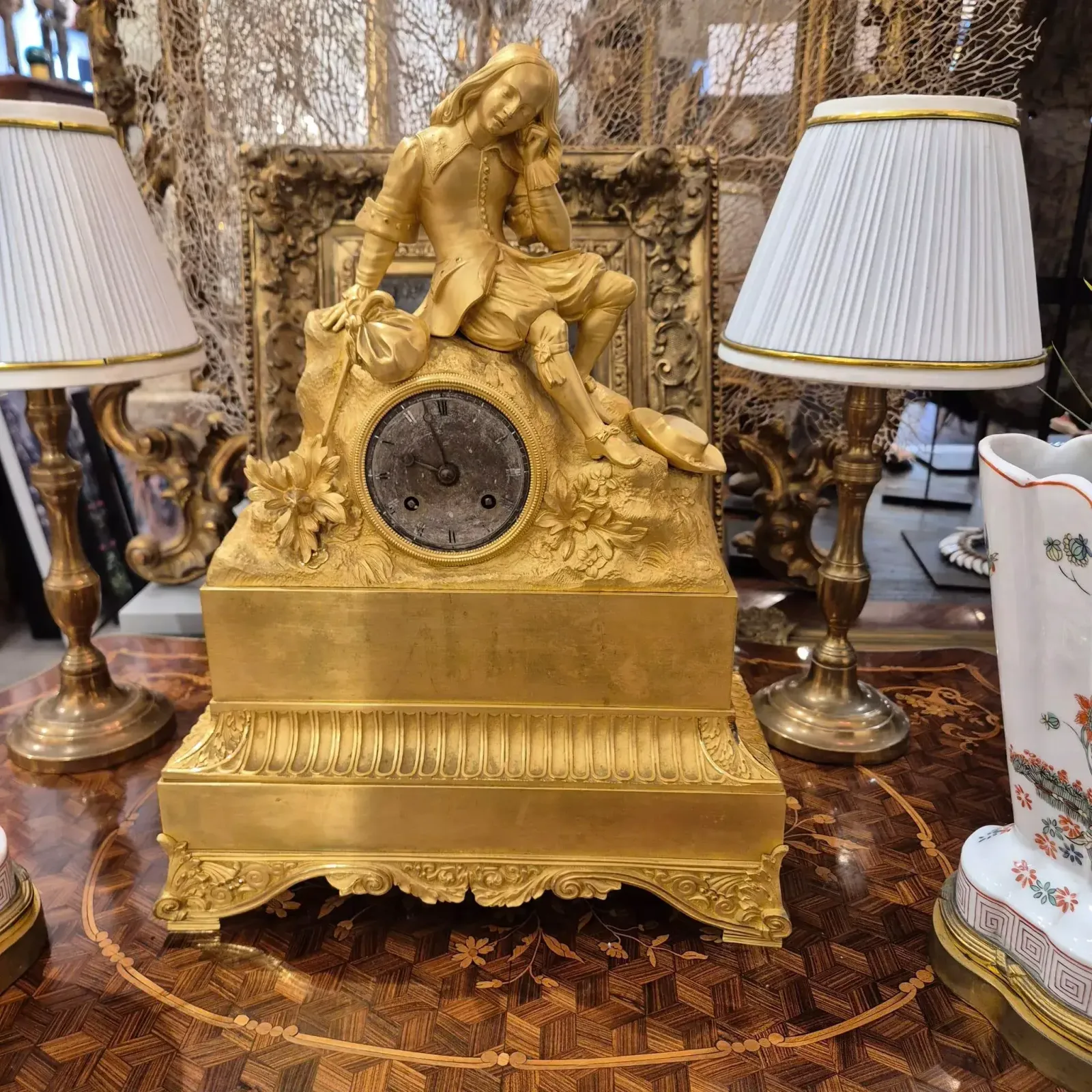 19th Century Charles X Clock With A Statue Of A Romantic Young Nobleman.