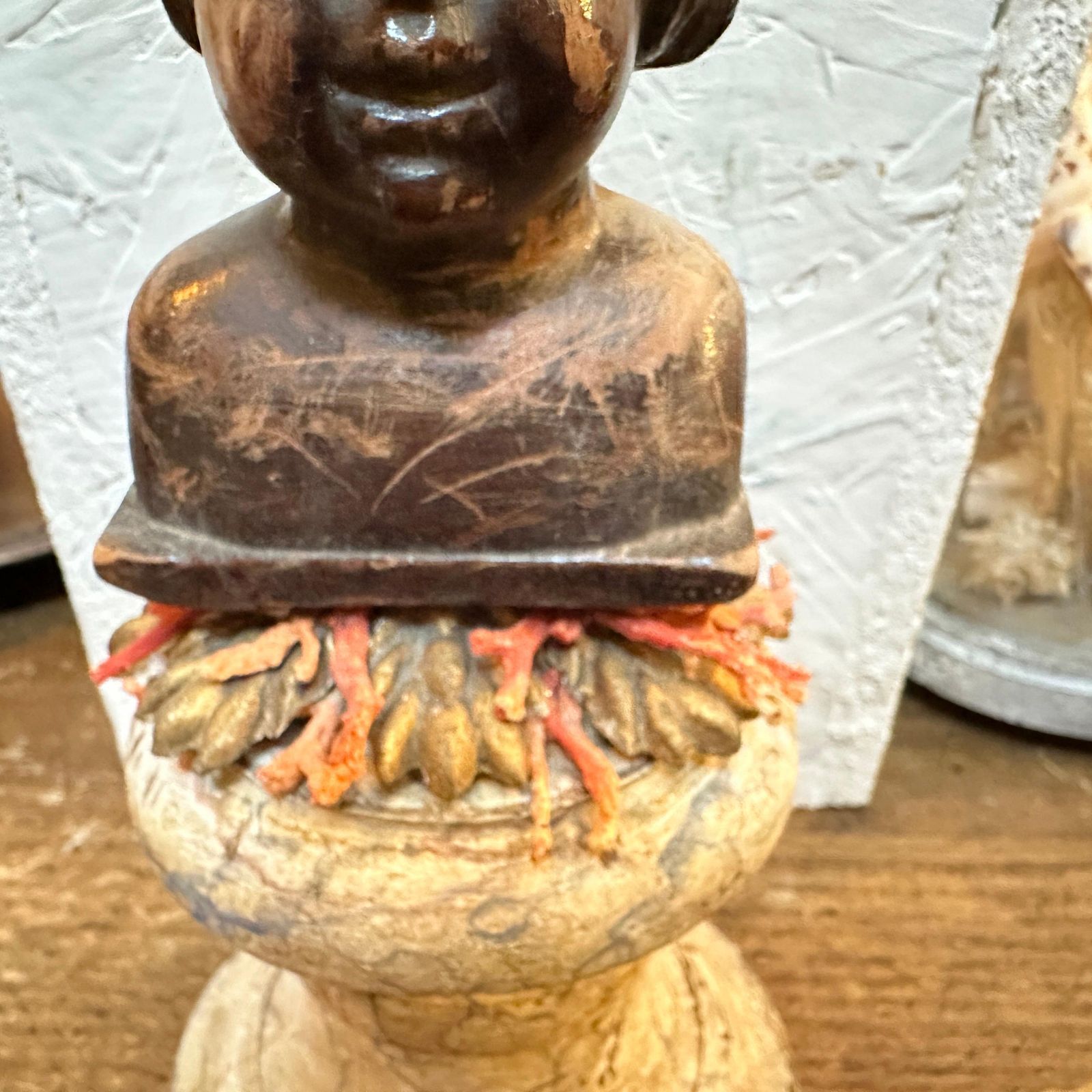 A Baroque Revival Wood Bust Of A Putto On A Fake Marble Lacquered Wood Base photo vinterior