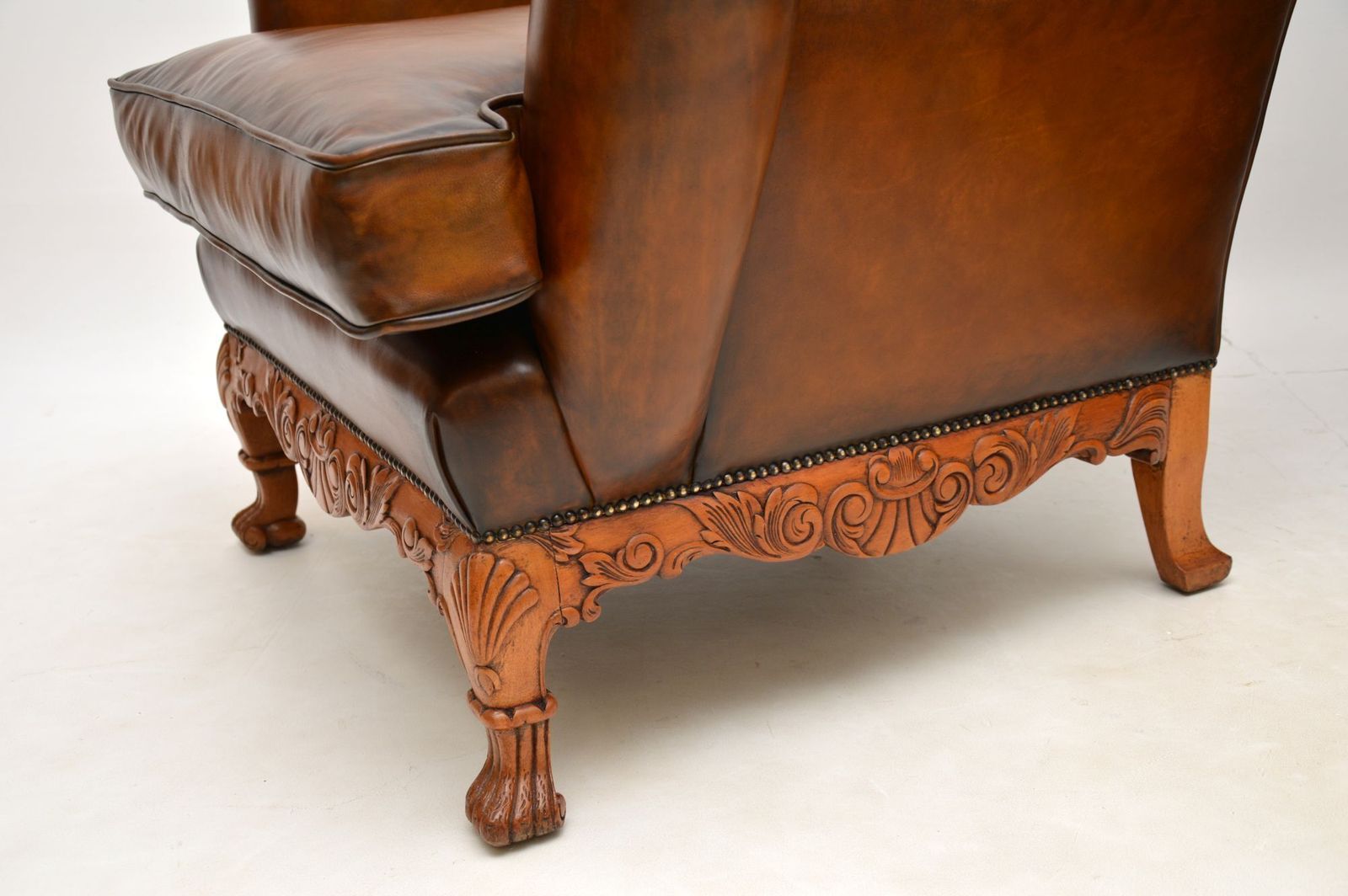 Pair Of Antique Leather Wing Back Armchairs photo vintage